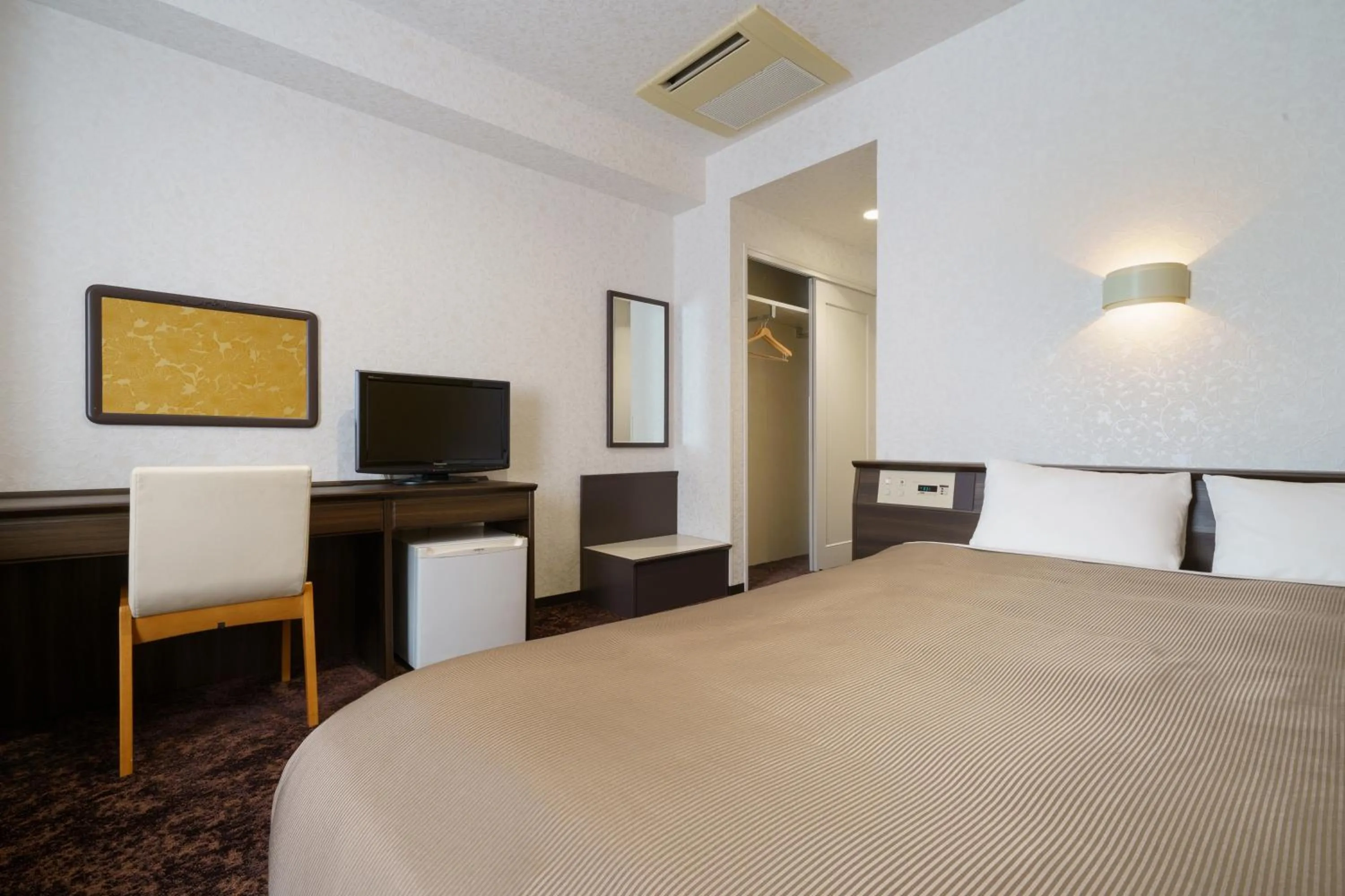 Bed in Hotel Centmain Nagoya