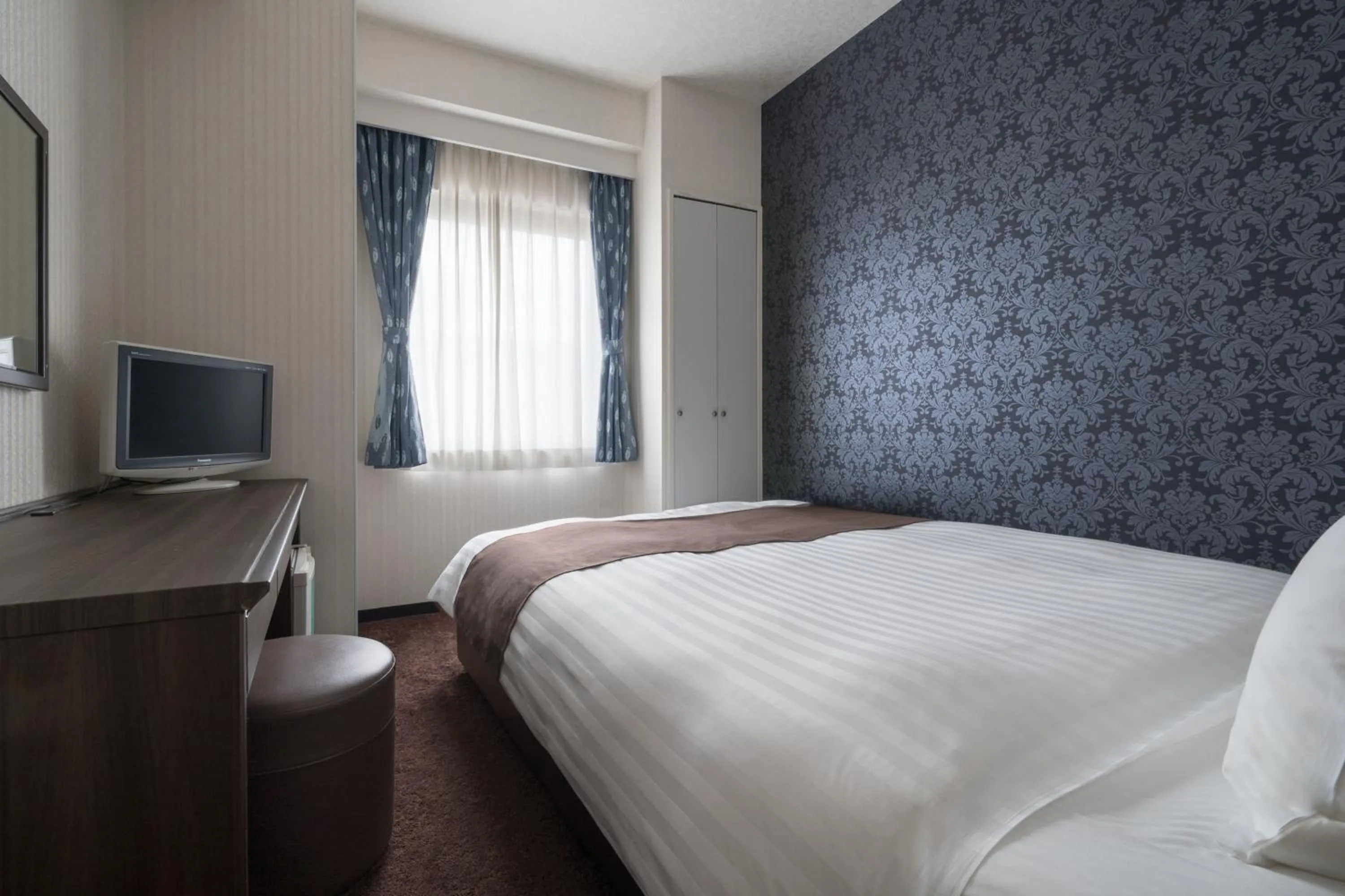 Bed in Hotel Centmain Nagoya