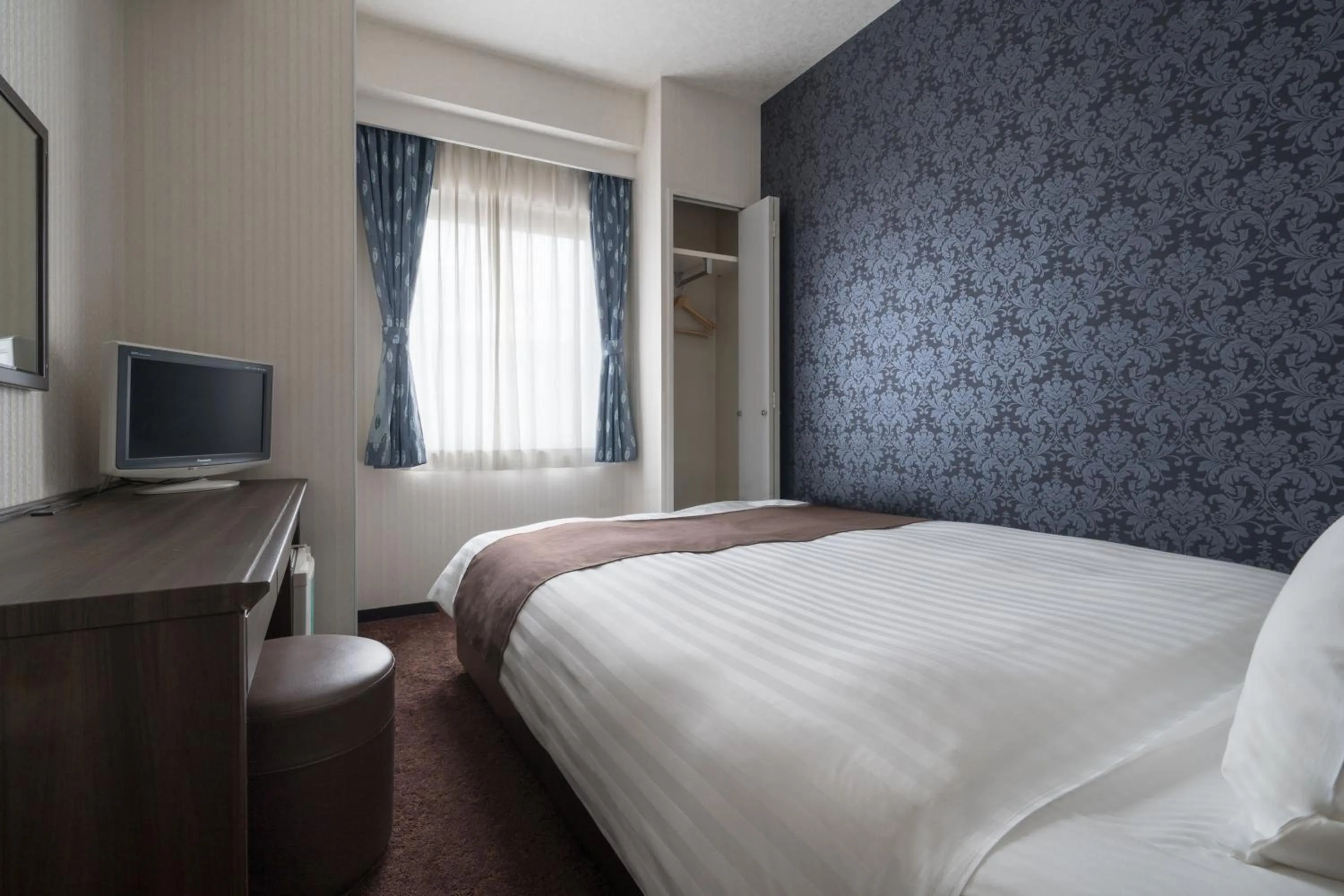 Bed in Hotel Centmain Nagoya