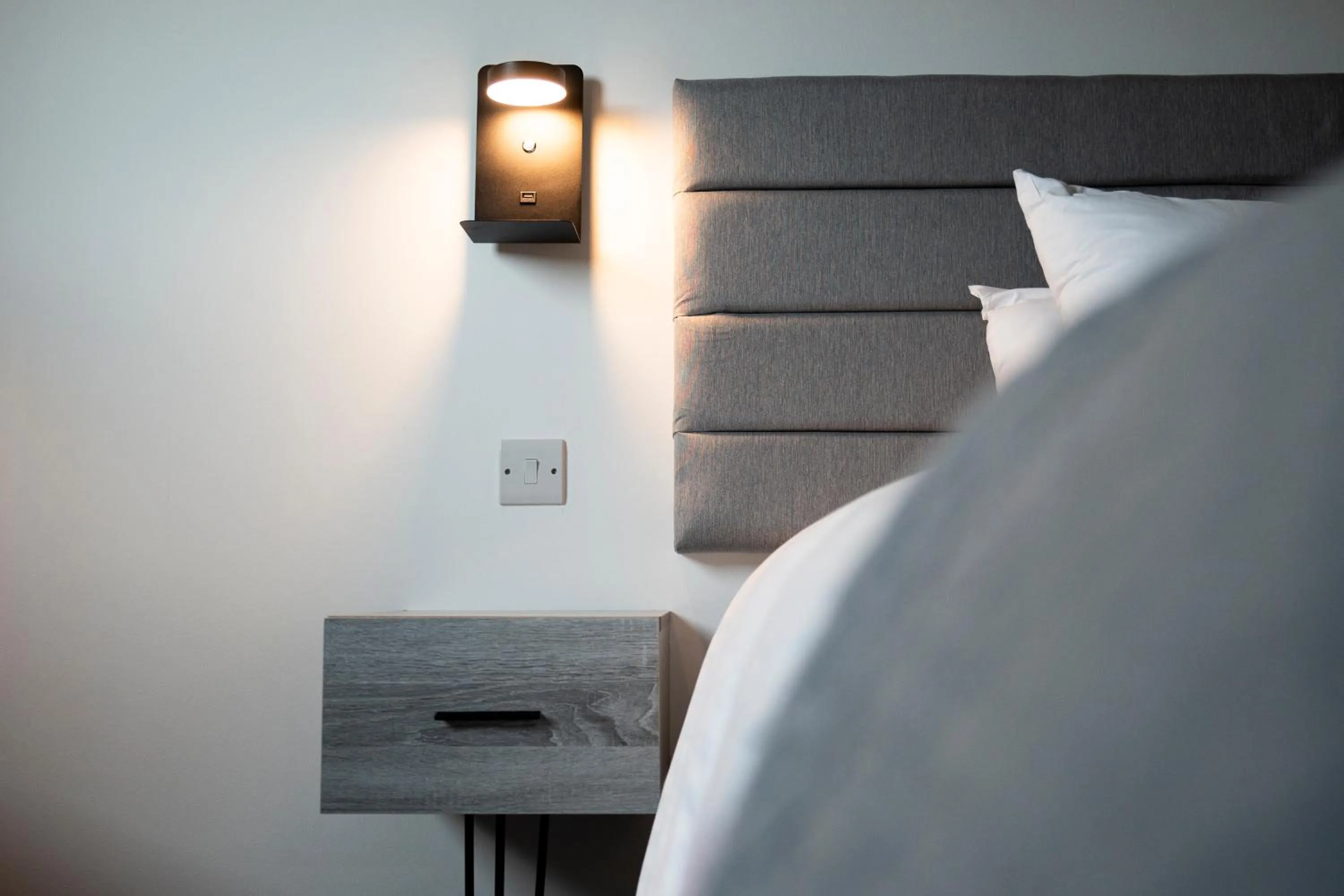 Bed in The Bolton Stadium Hotel, a member of Radisson Individuals