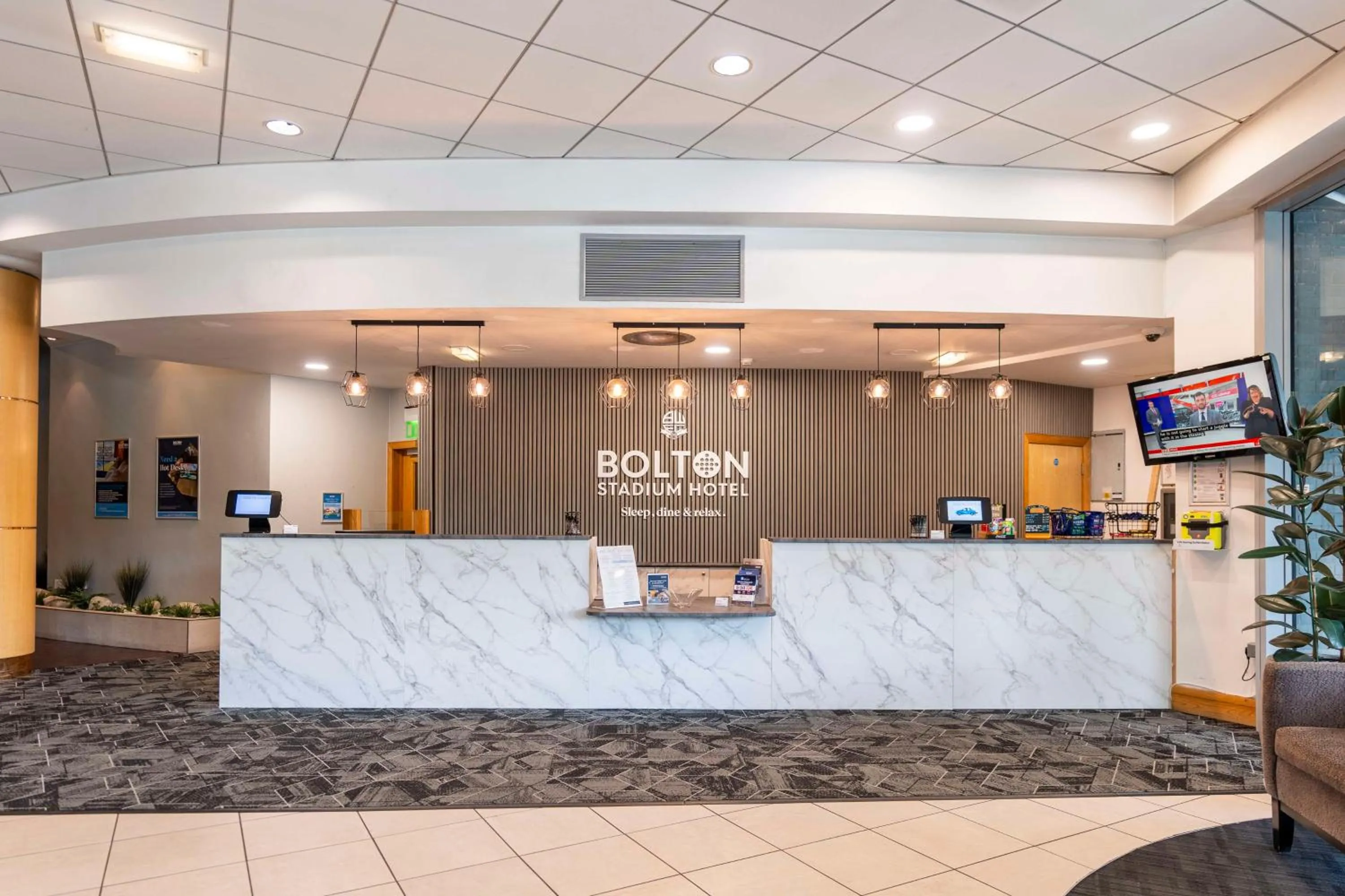 Lobby or reception in The Bolton Stadium Hotel, a member of Radisson Individuals