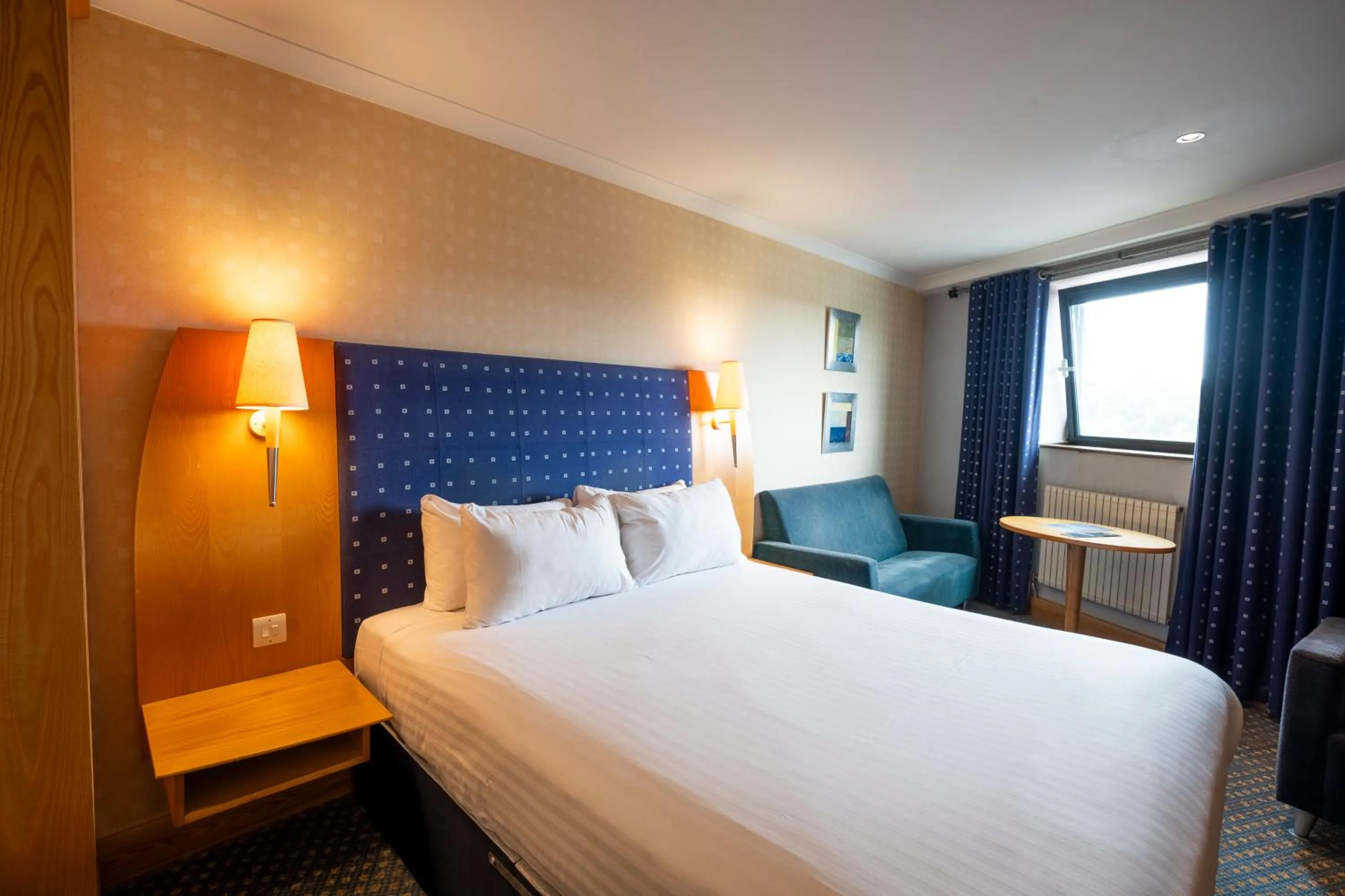 Bed in The Bolton Stadium Hotel, a member of Radisson Individuals