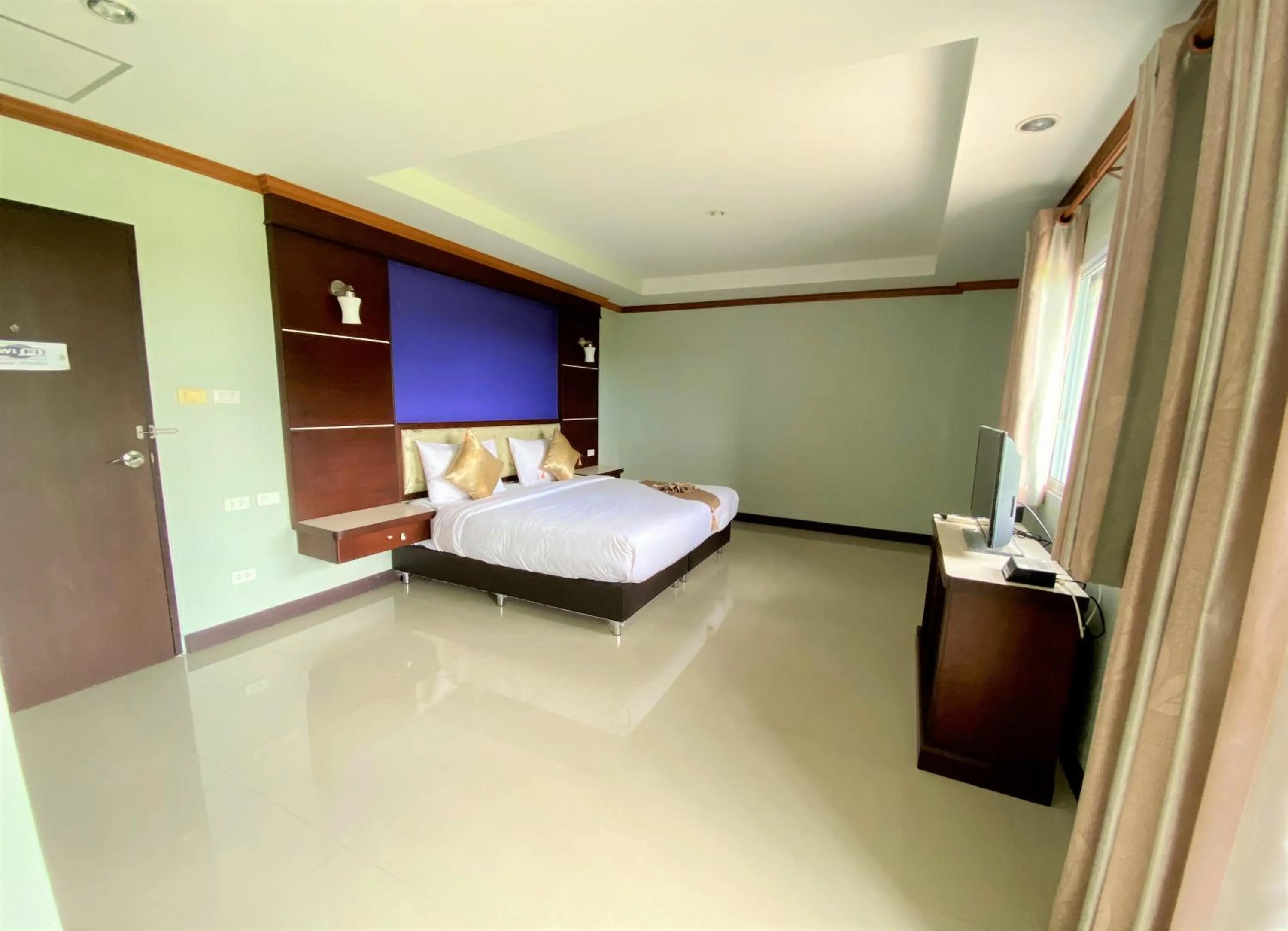 Bed in Thungtawan Hotel