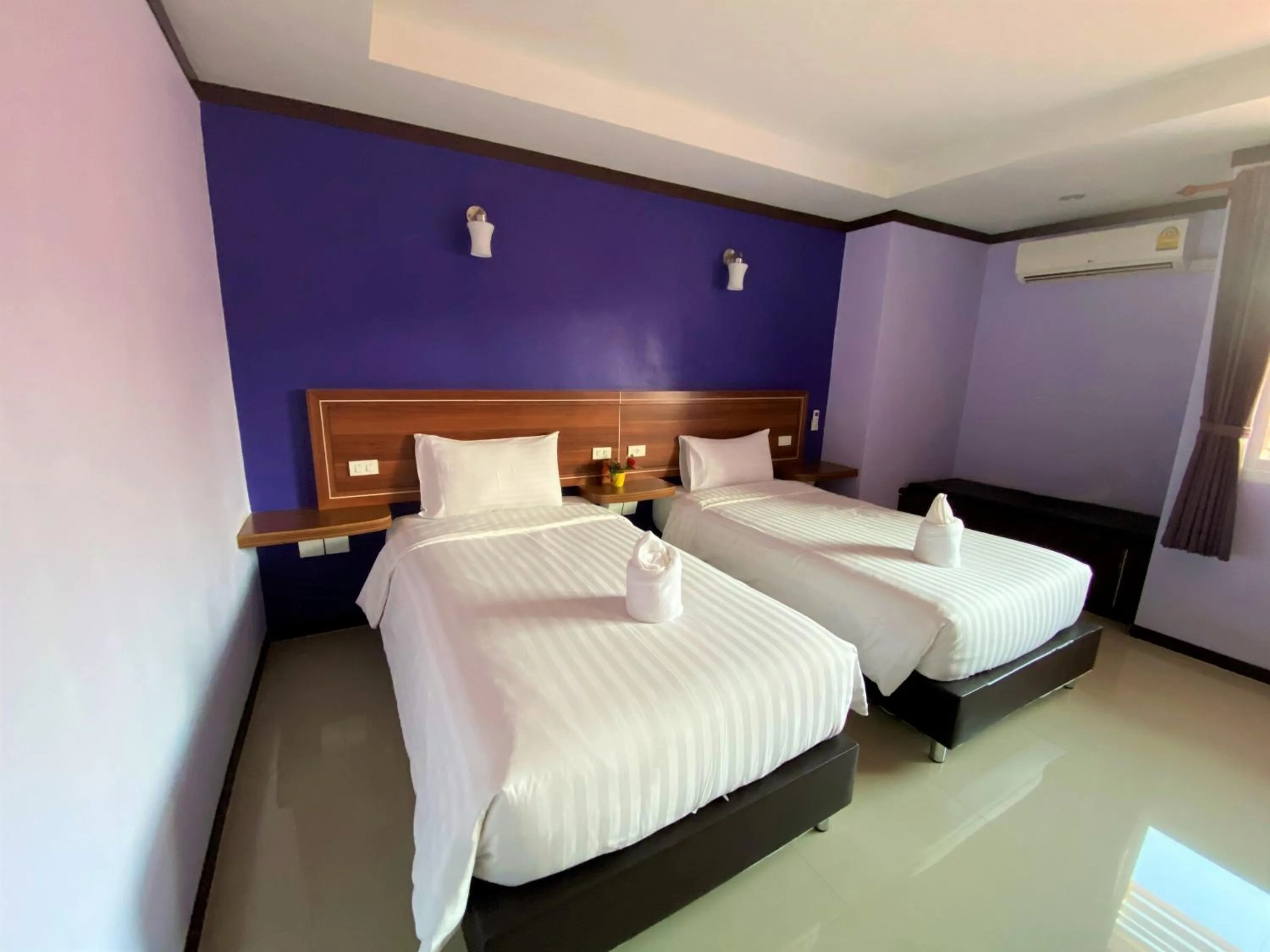 Bed in Thungtawan Hotel