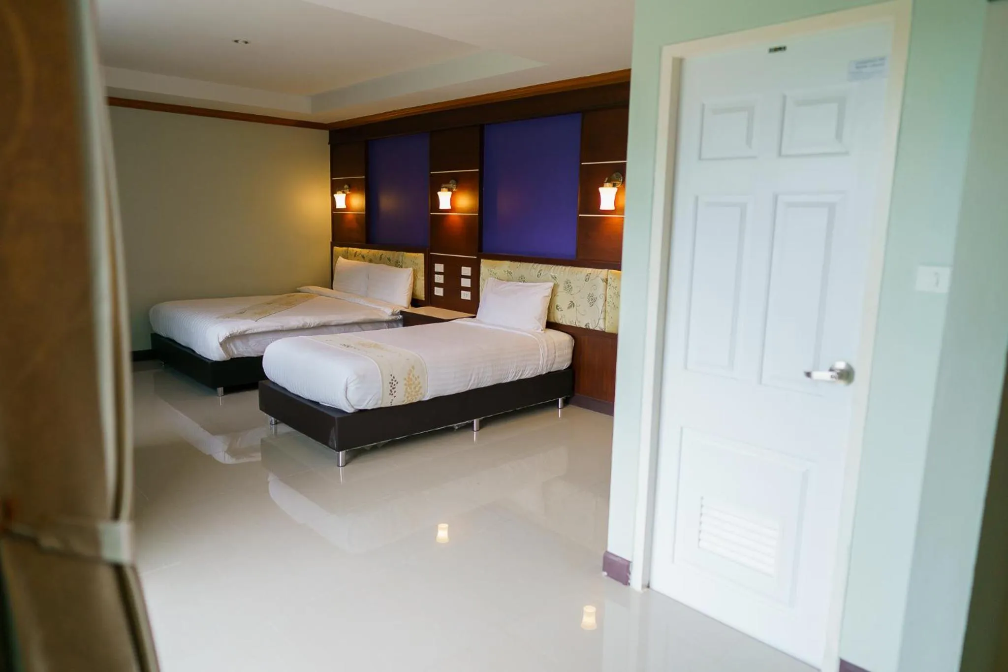 Bed in Thungtawan Hotel