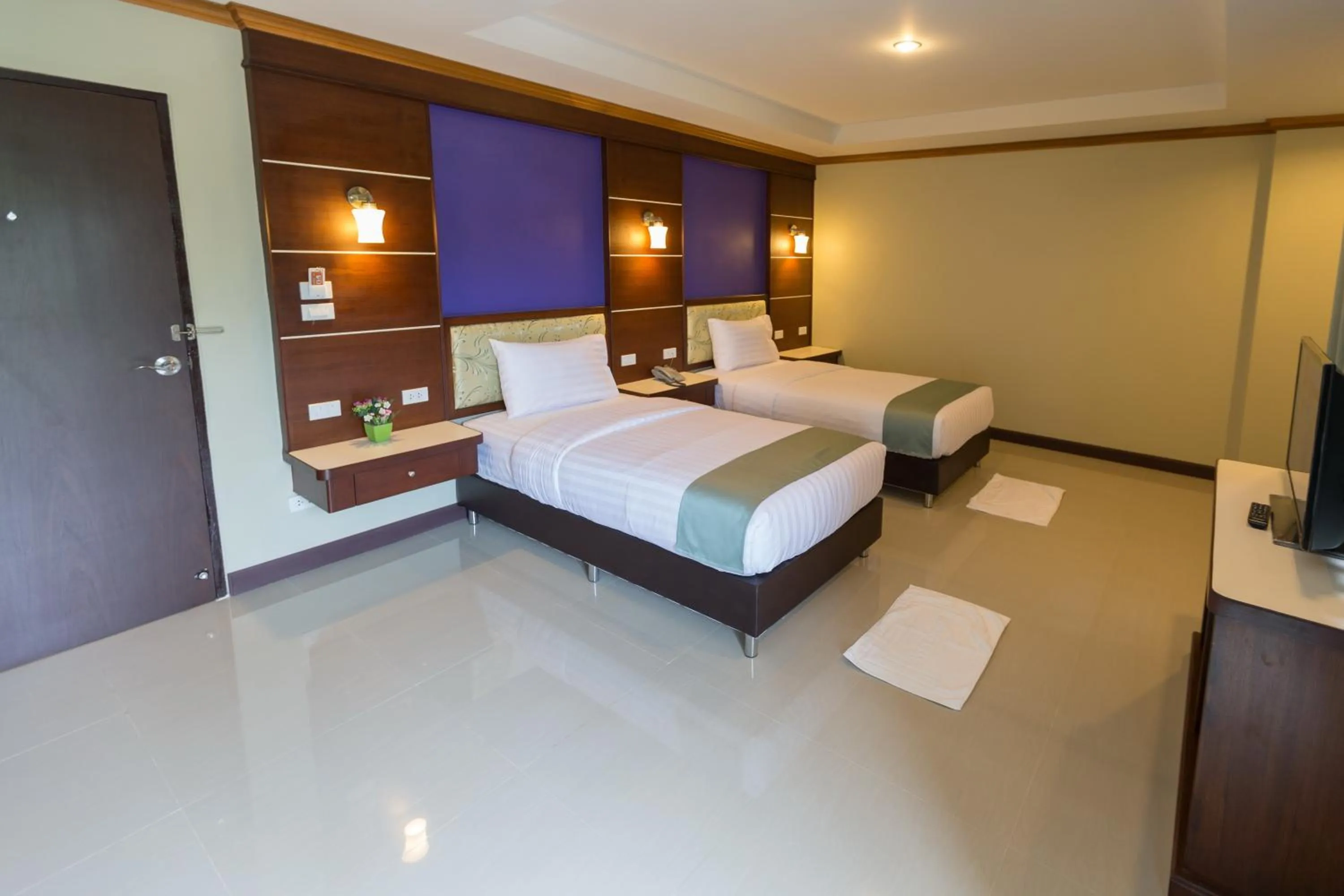 Bed in Thungtawan Hotel