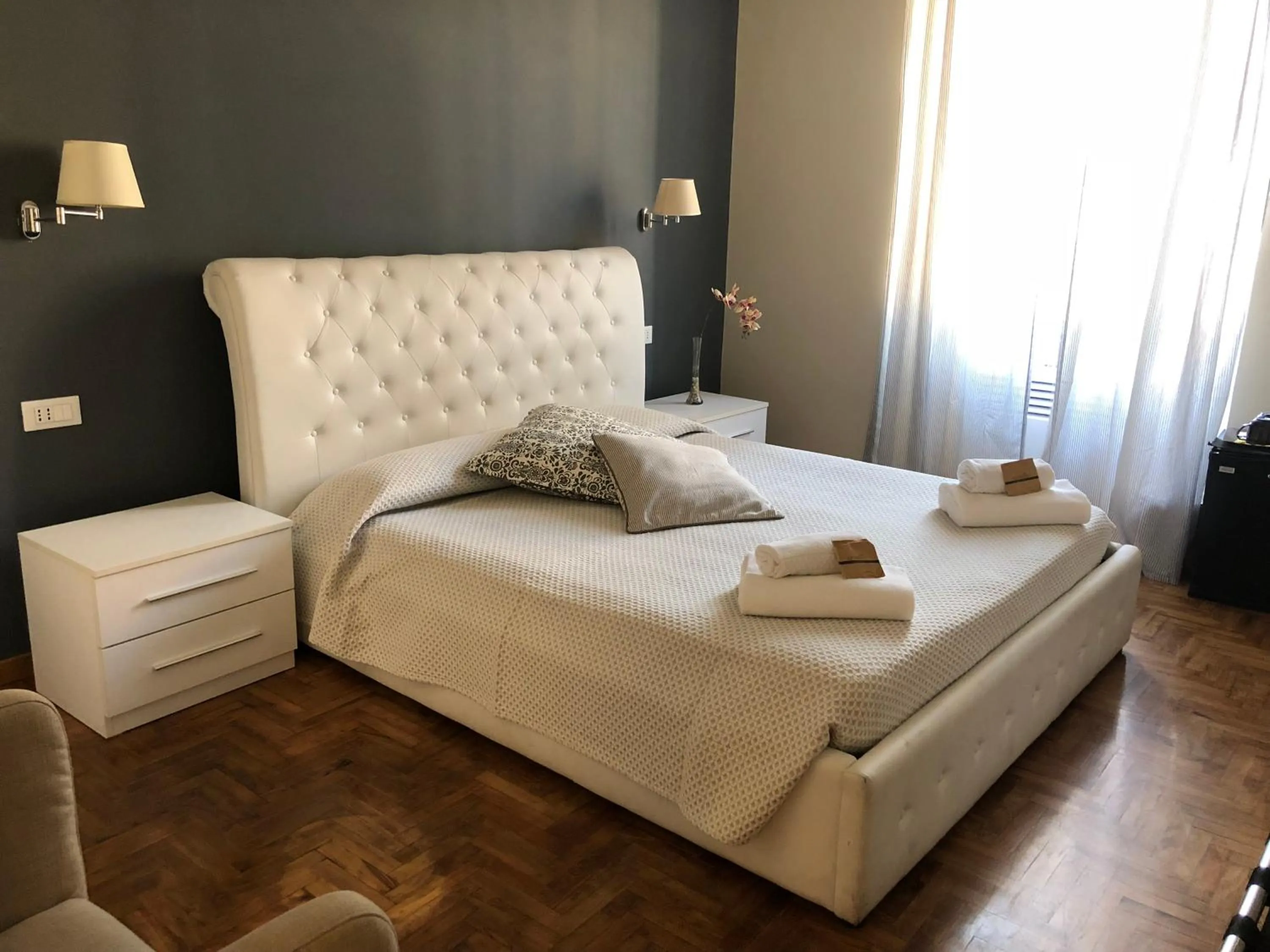 Bed in San Vito Suites