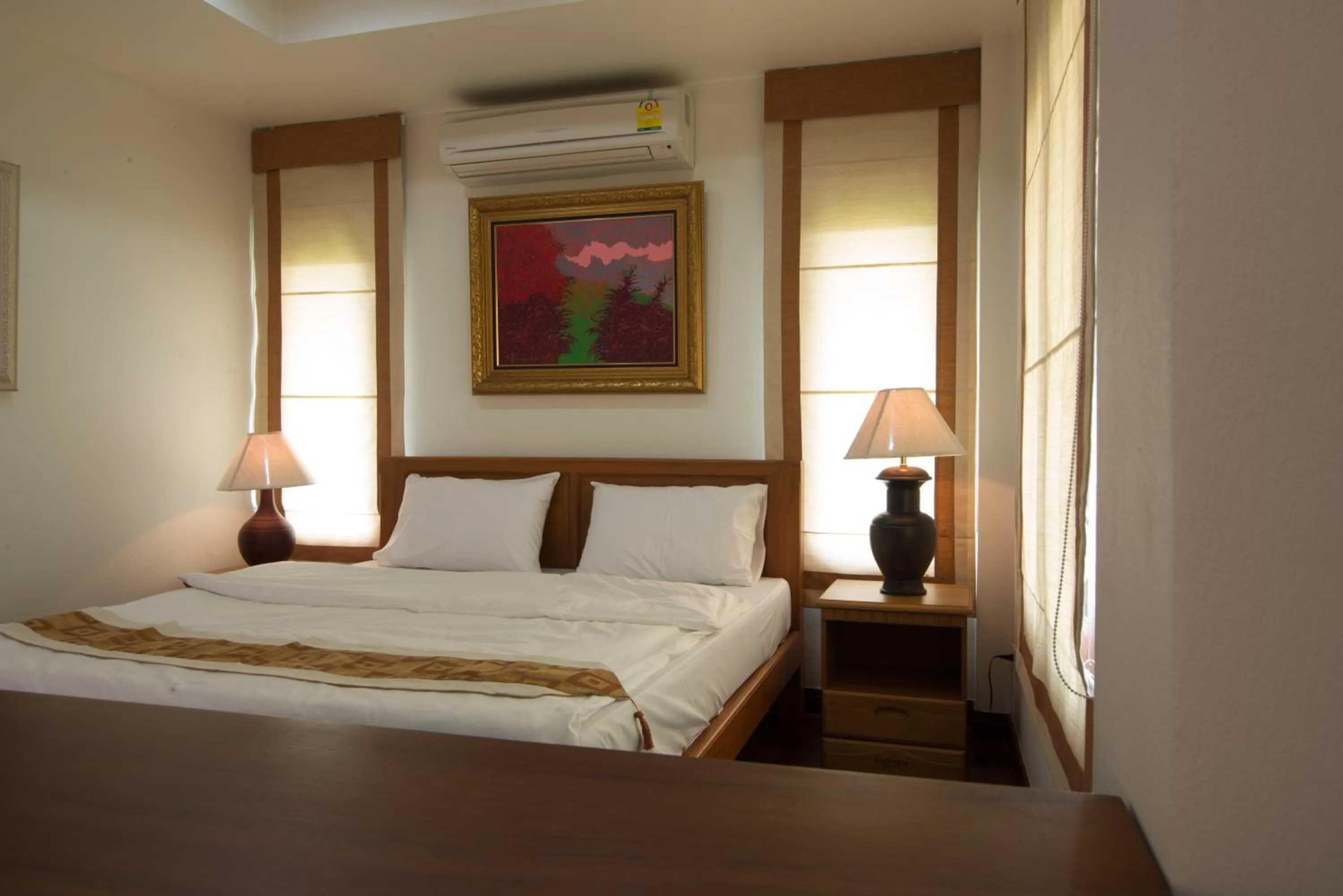 Bed in Thaihome Resort