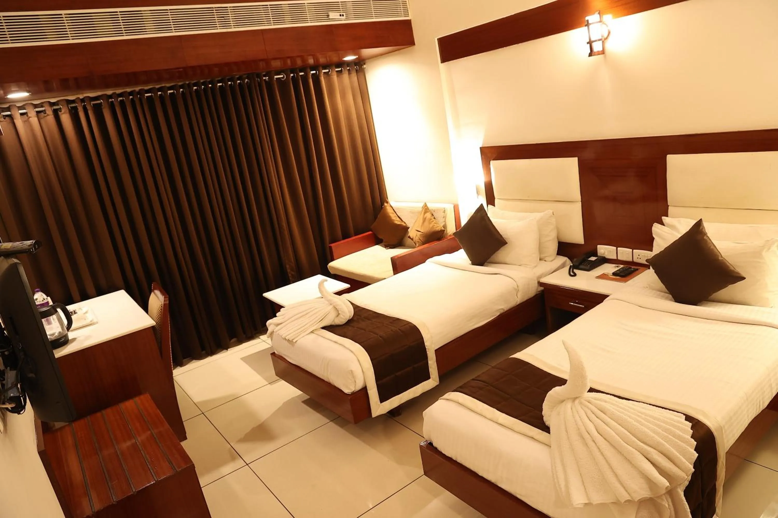 Bed in KTDC Rain Drops Hotel