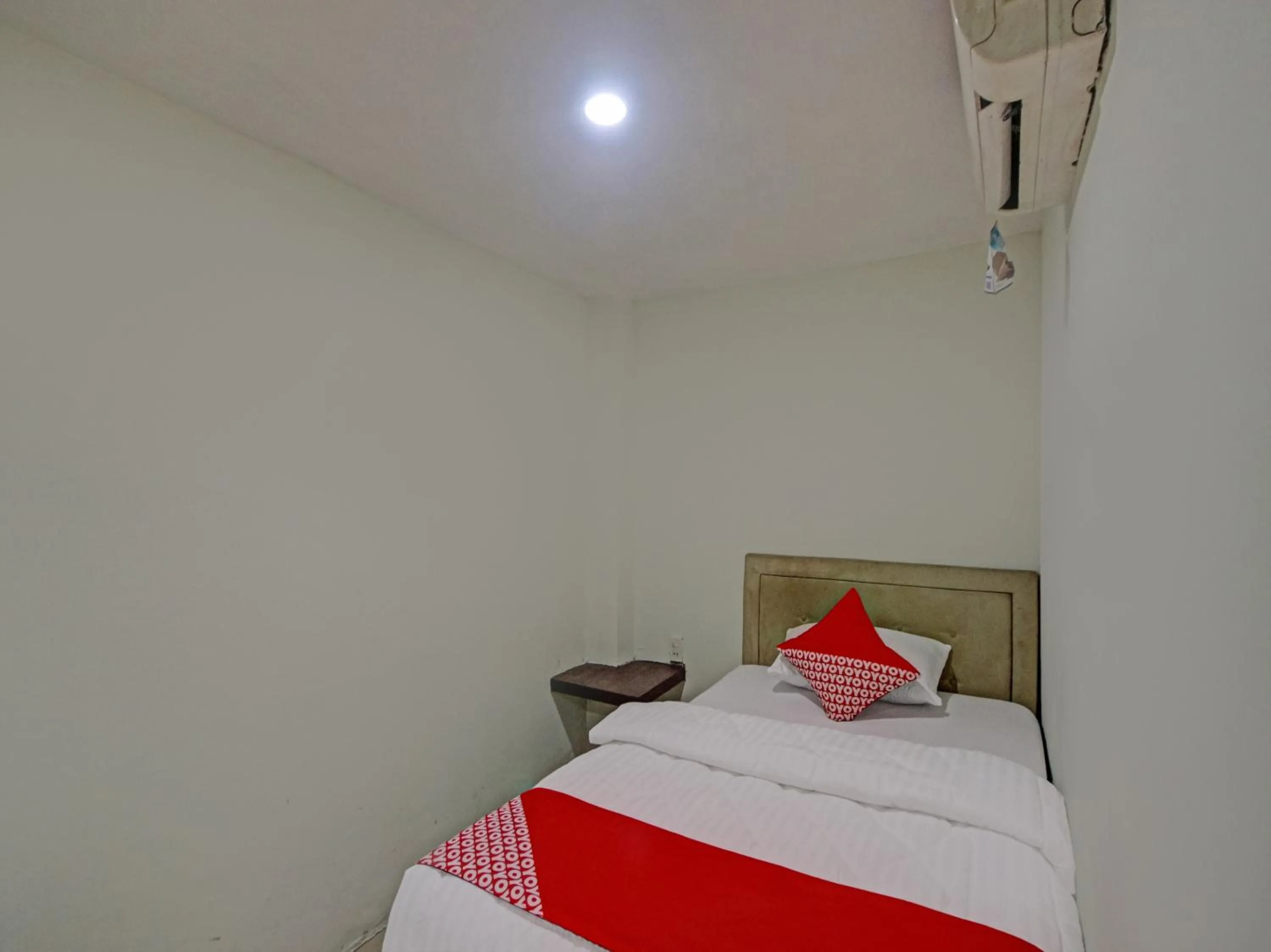 Bedroom in OYO 2574 Z Suites Hotel