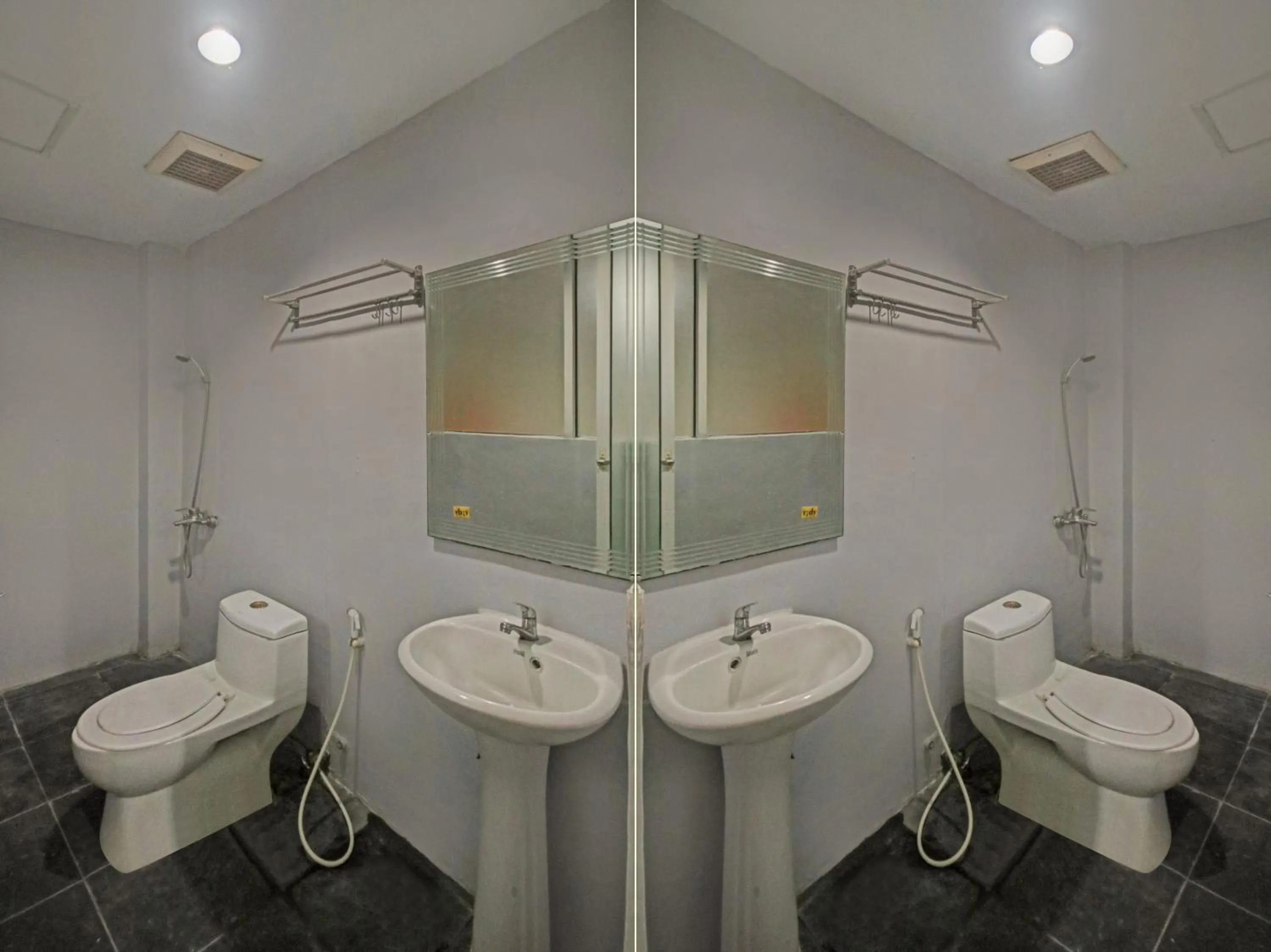 Bathroom in OYO 2574 Z Suites Hotel