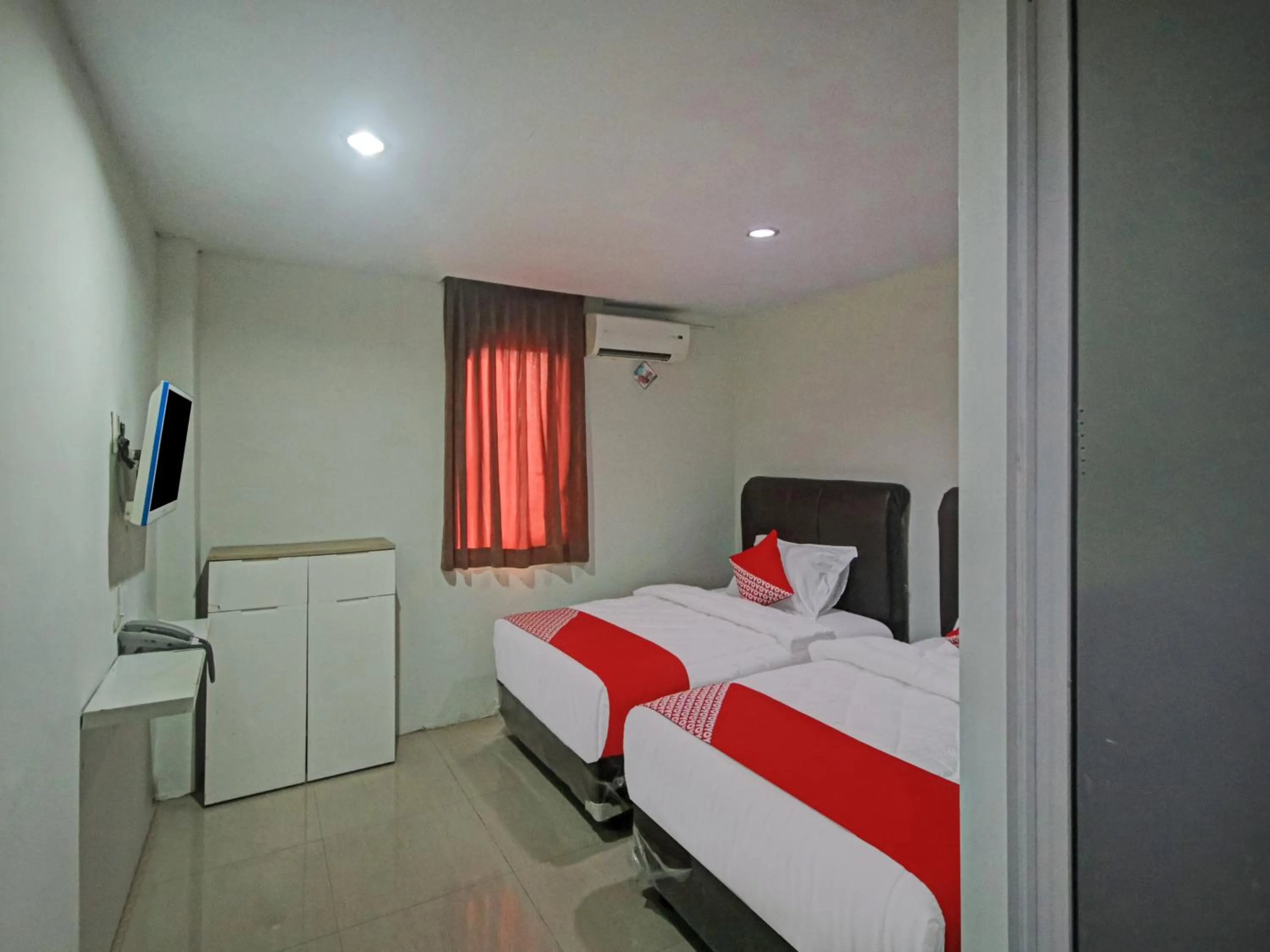 Bedroom in OYO 2574 Z Suites Hotel