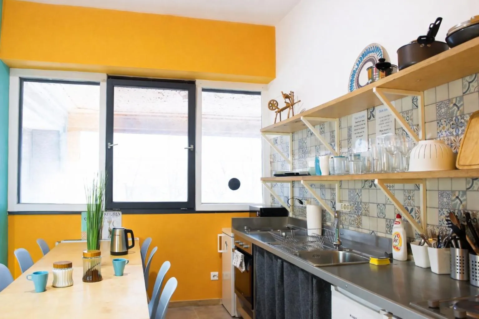 Communal kitchen in WOW City Hostel