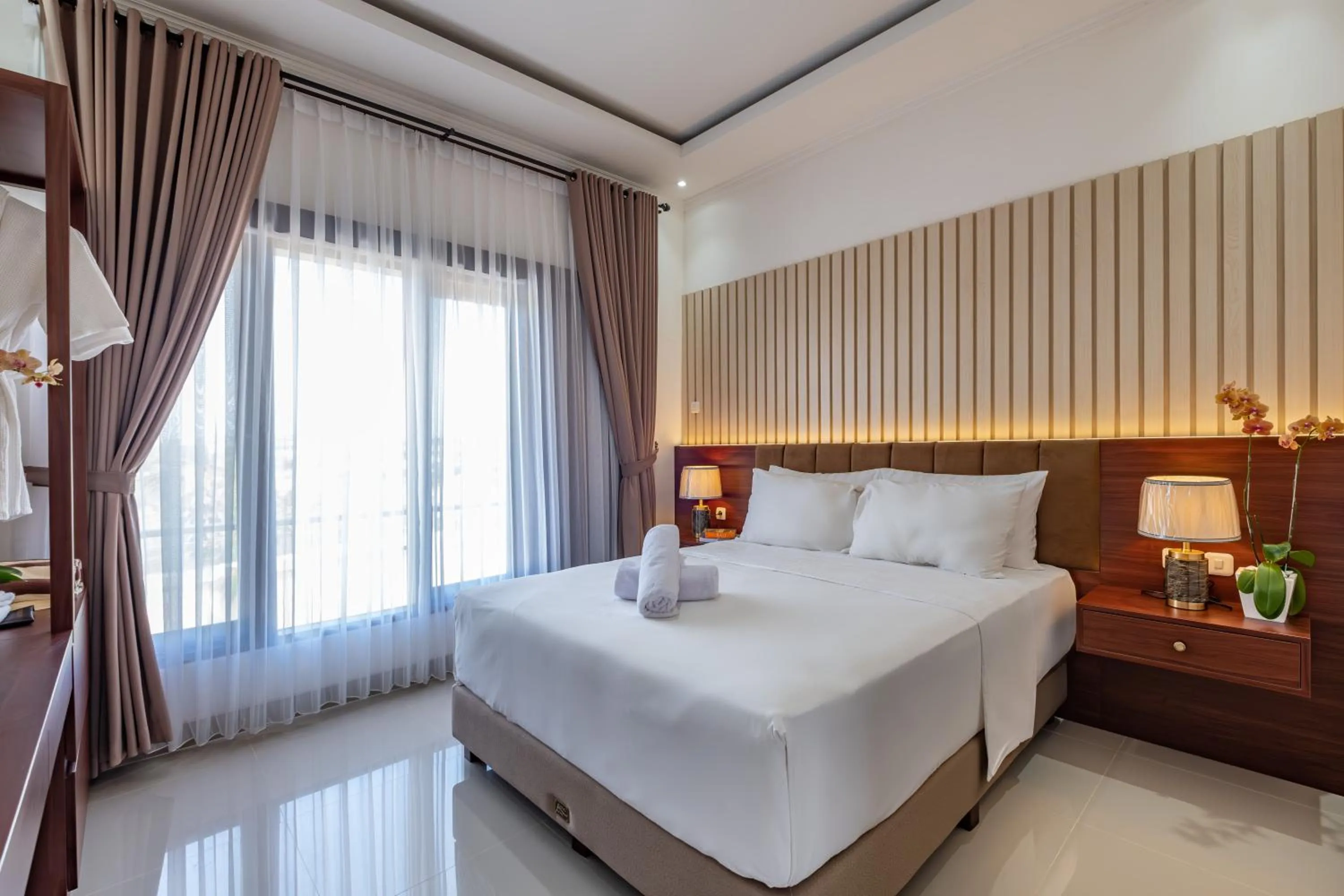 Bed in Taman Seminyak Suites
