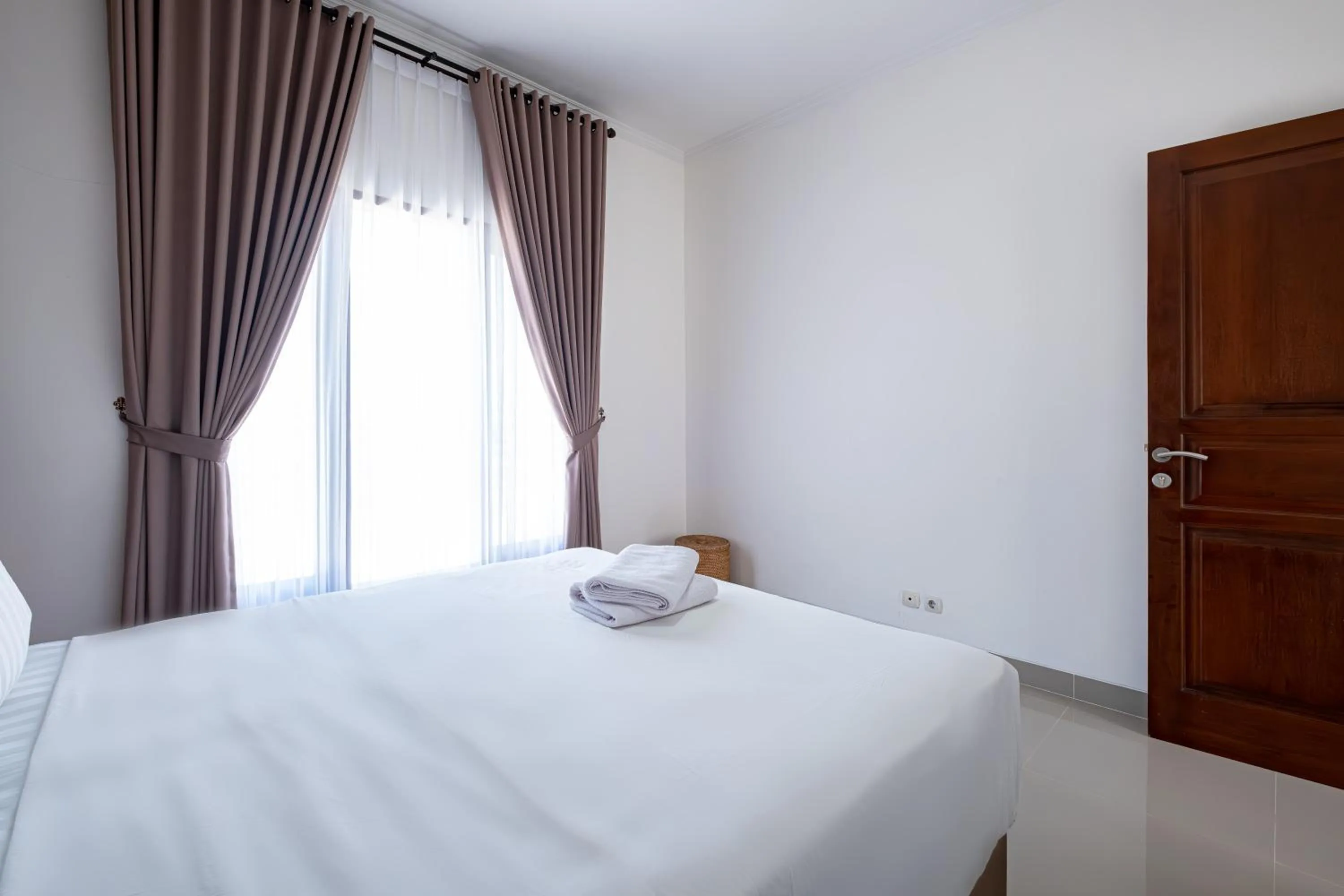 Bed in Taman Seminyak Suites