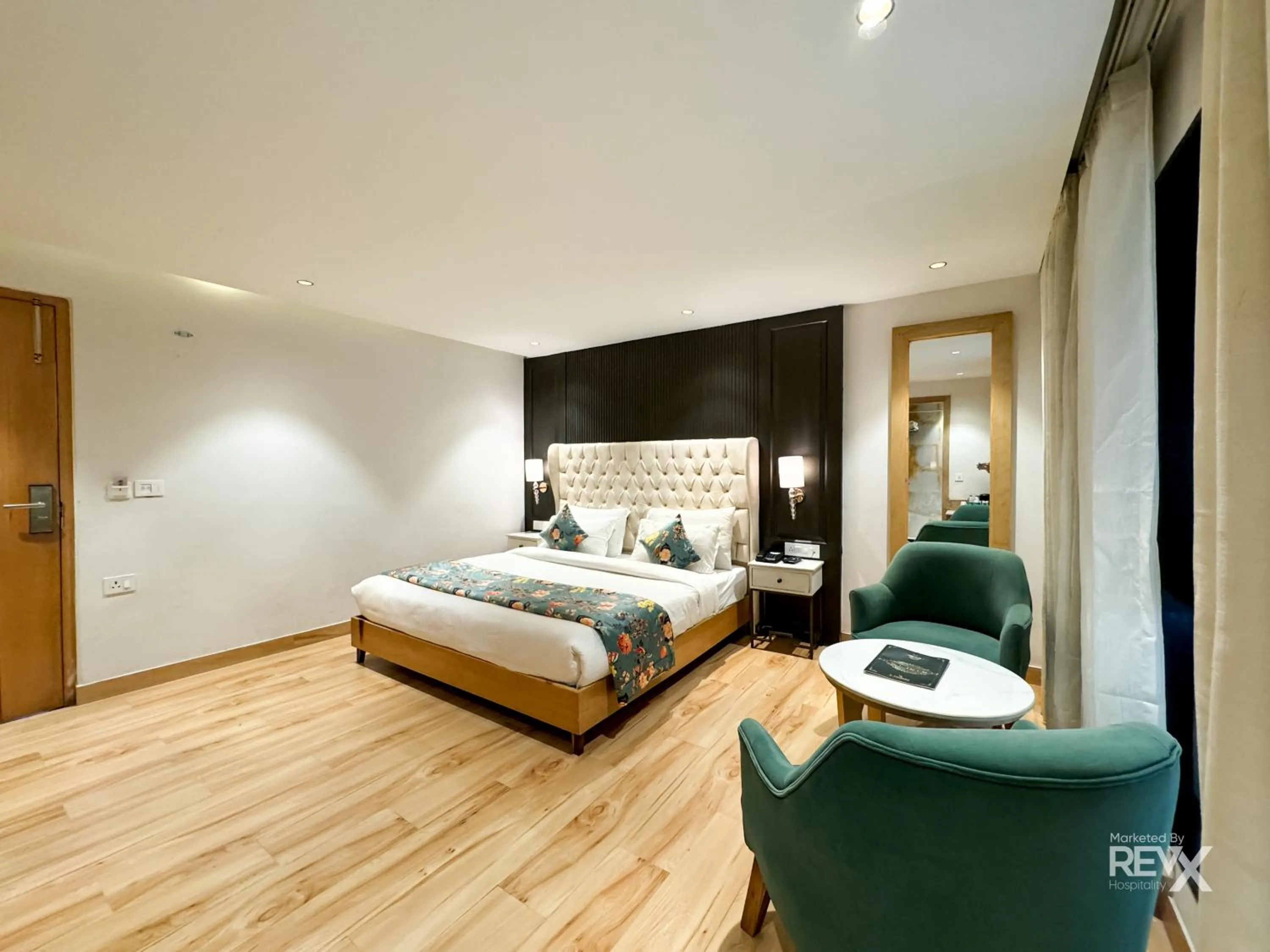 Photo of the whole room, Bed in Hotel Rockland Residency