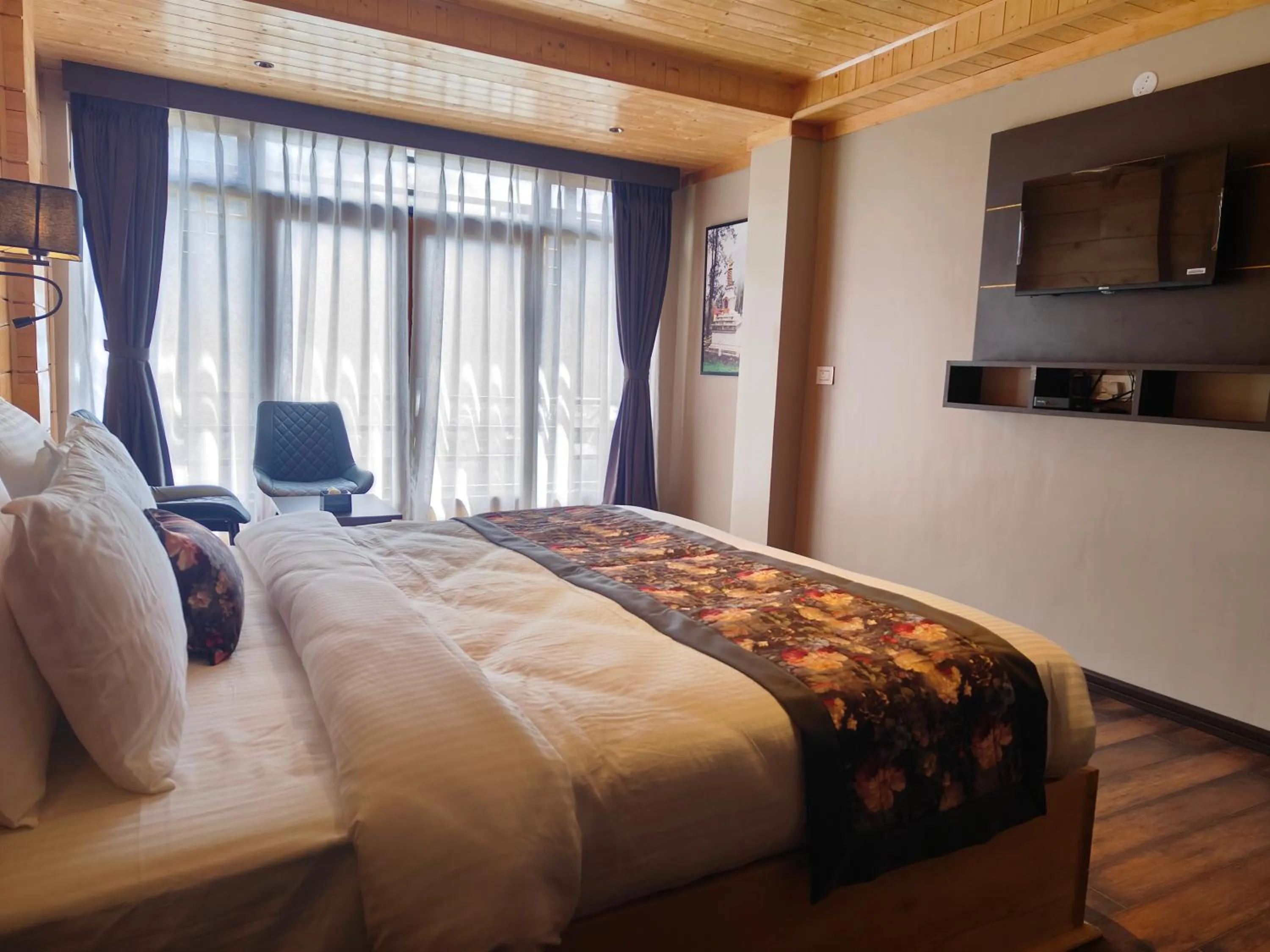 Bed in Mount Bayul Shangri-La Resort