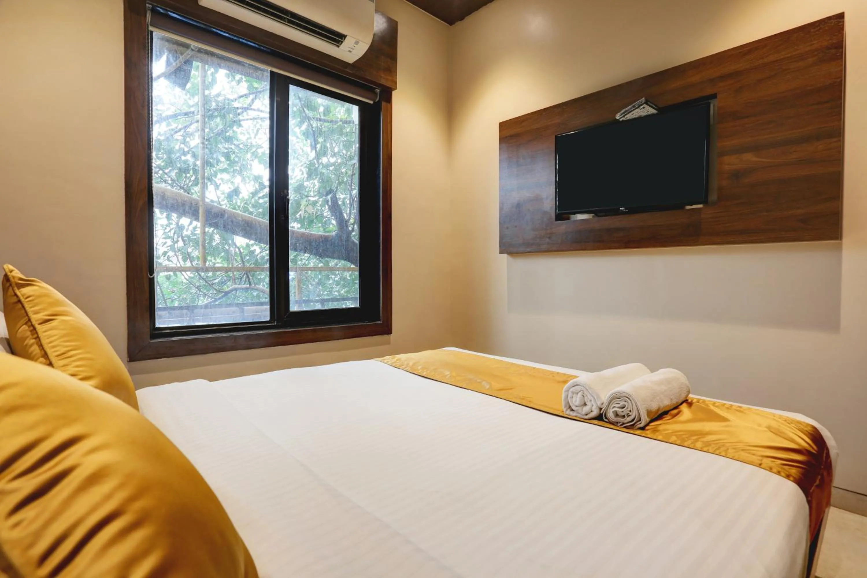 Bed in Hotel Sea Breeze