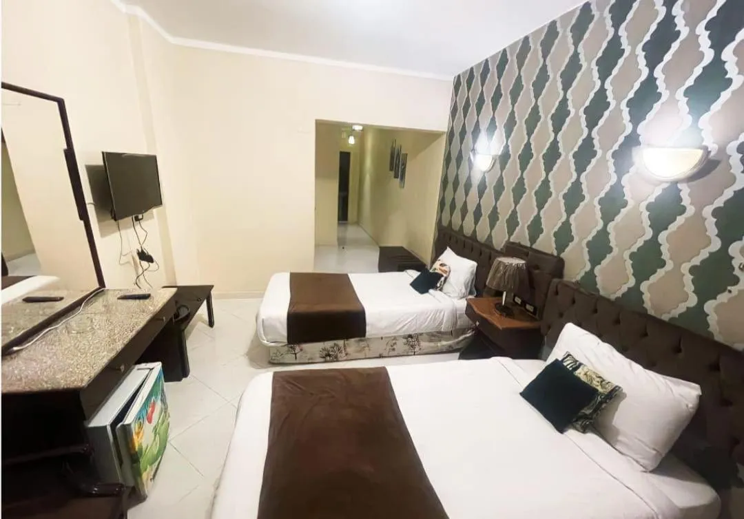 Bedroom, Bed in Golden Sun Hotel - Hurghada