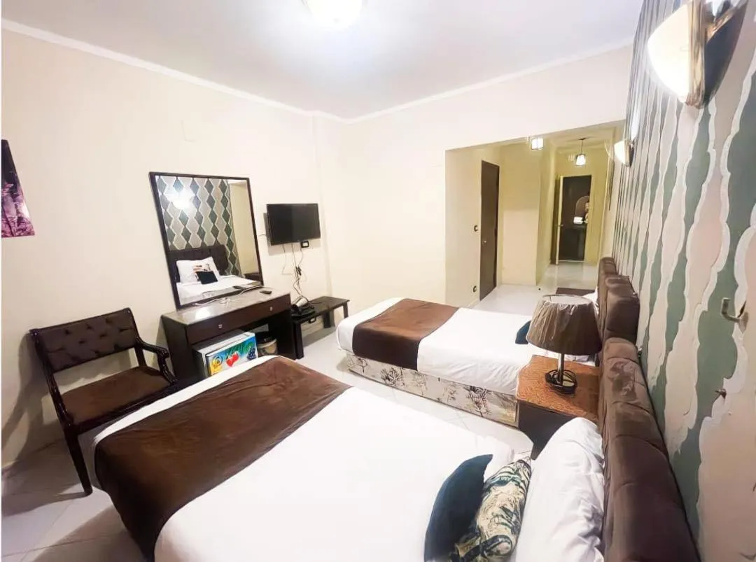 Bedroom, Bed in Golden Sun Hotel - Hurghada