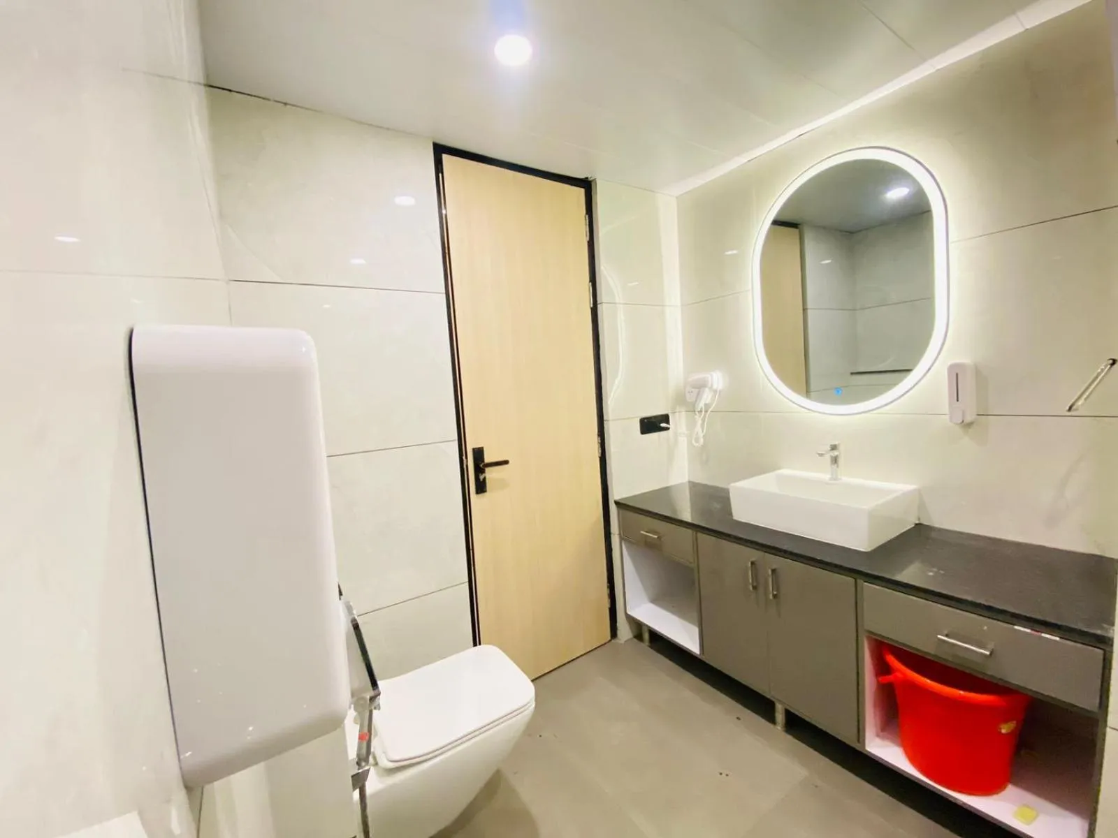 Bathroom in Hotel Holiday Grand
