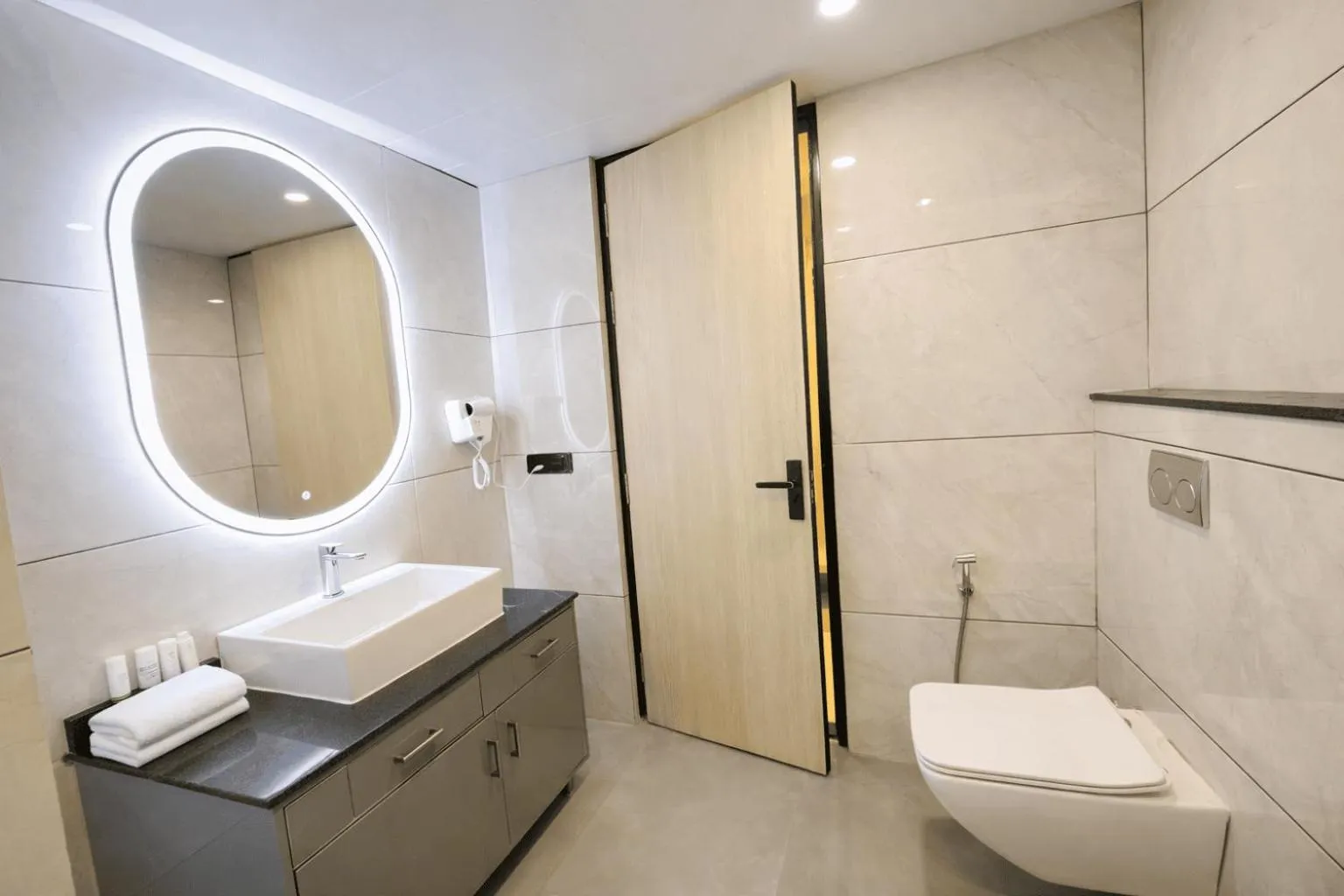 Bathroom in Hotel Holiday Grand