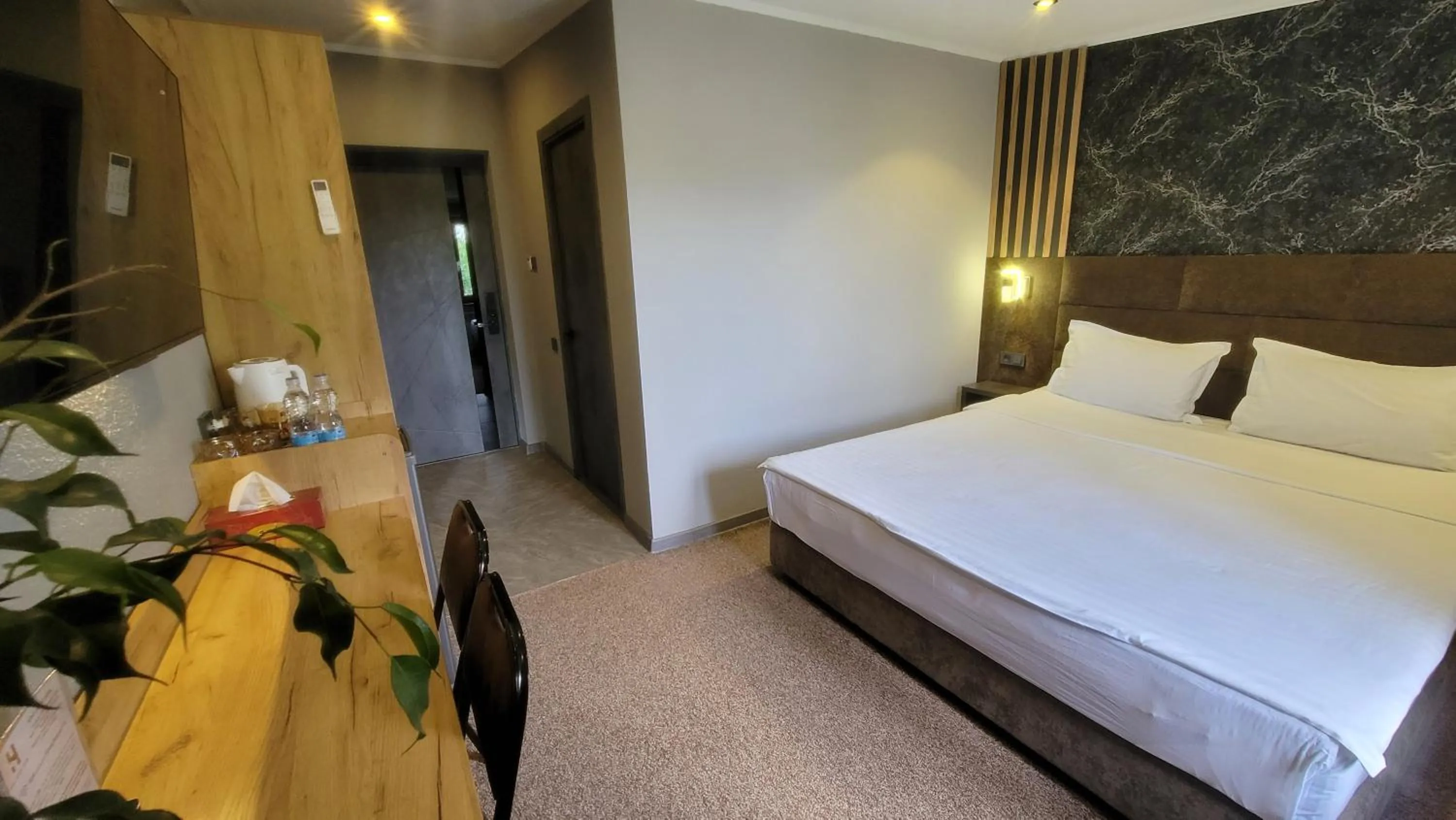 Bed in Homy House Hotel