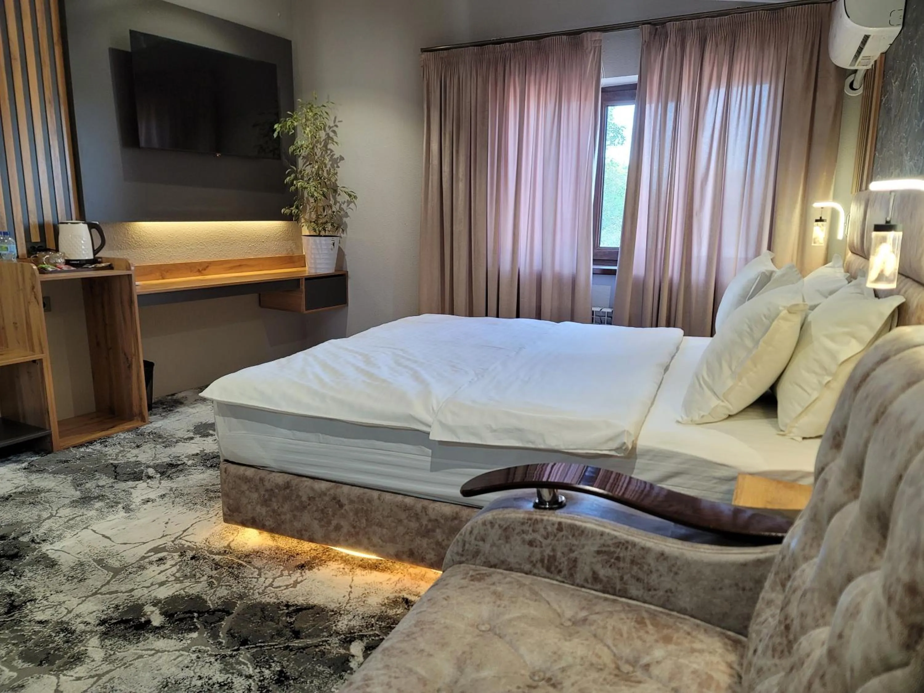 Bed in Homy House Hotel