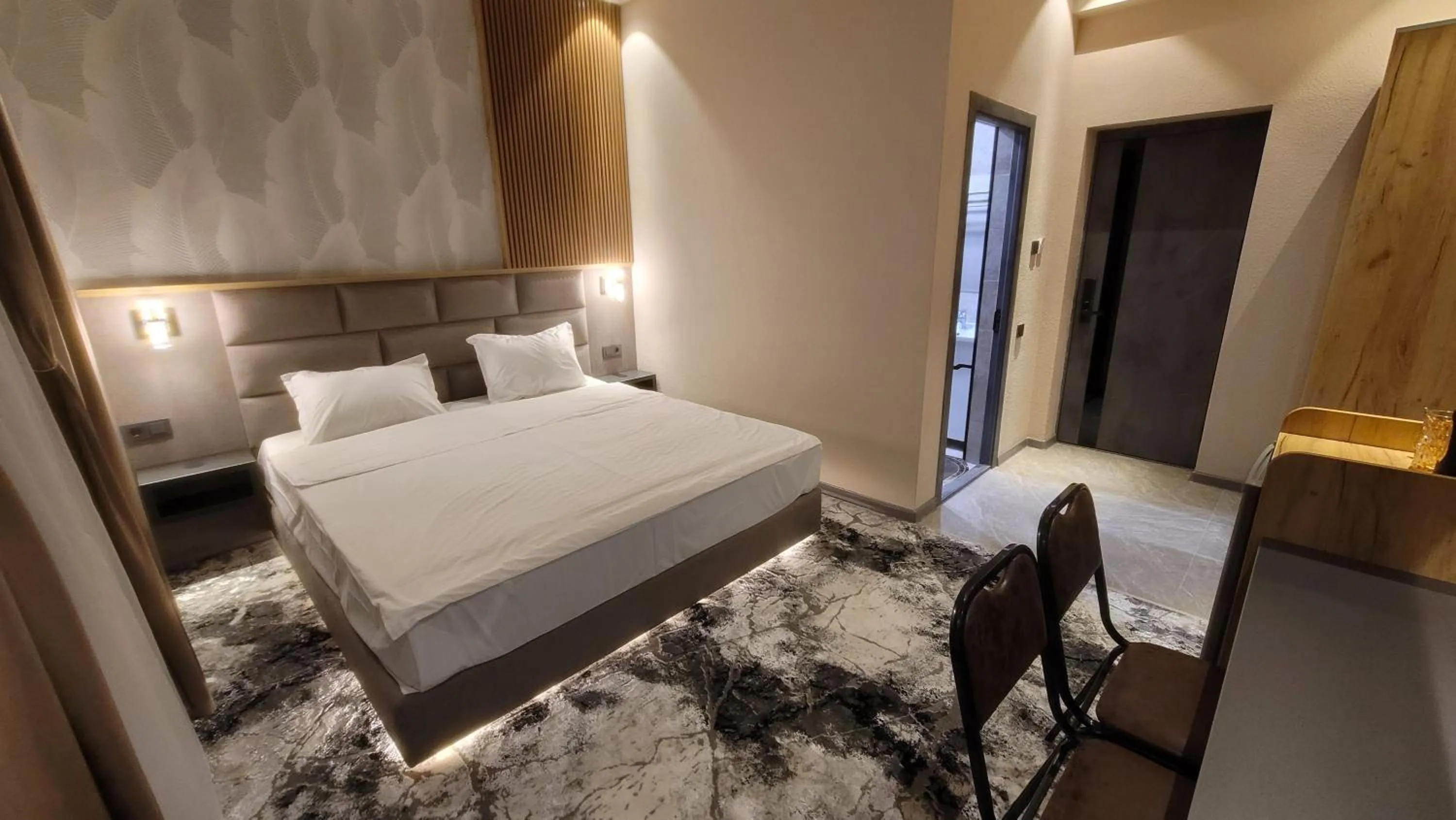 Bed in Homy House Hotel