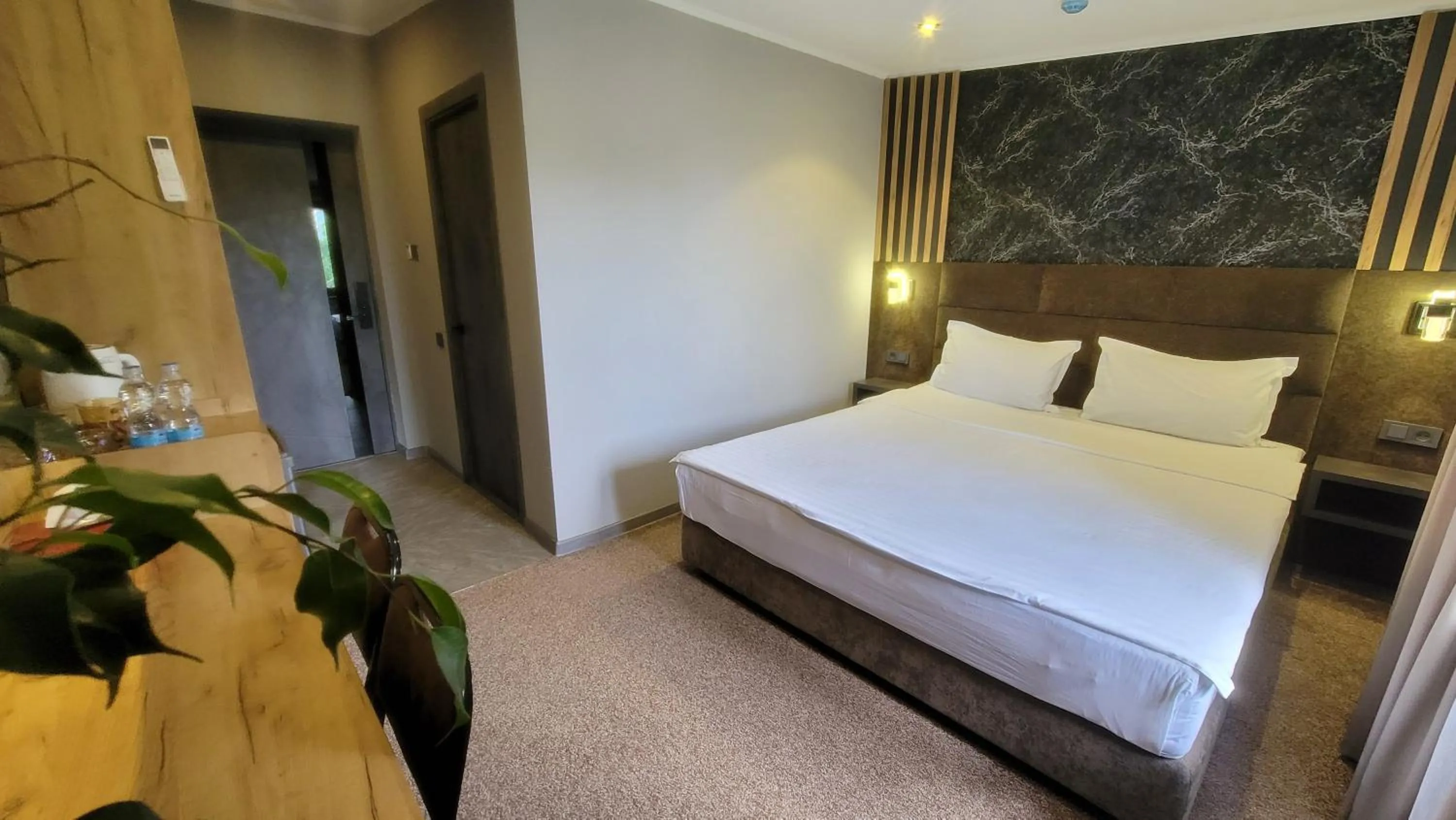 Bed in Homy House Hotel