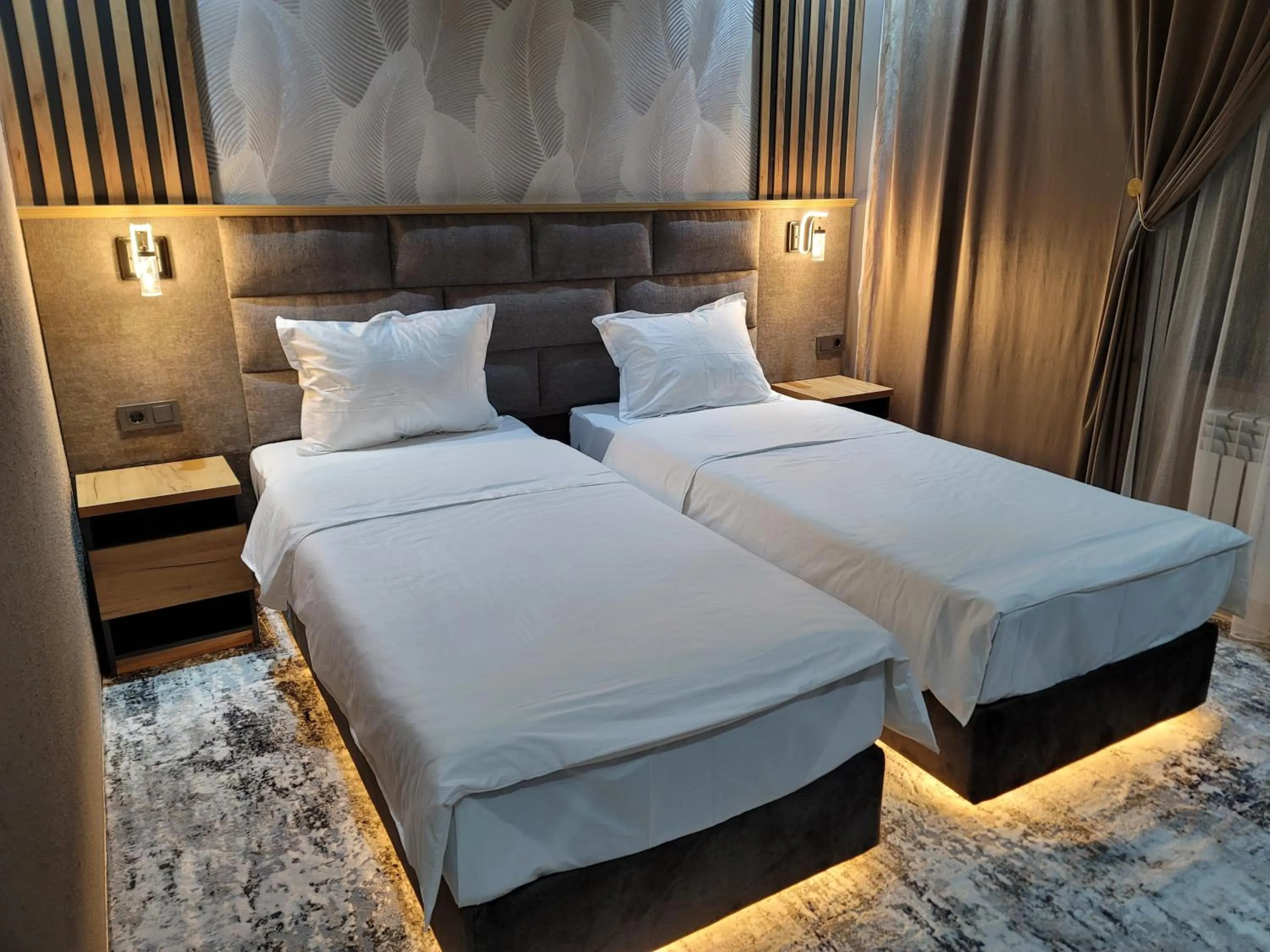 Bed in Homy House Hotel