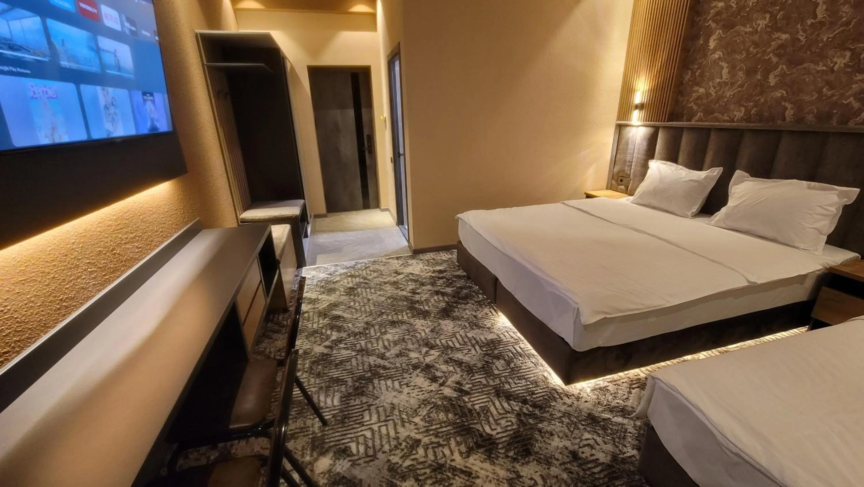 Bed in Homy House Hotel