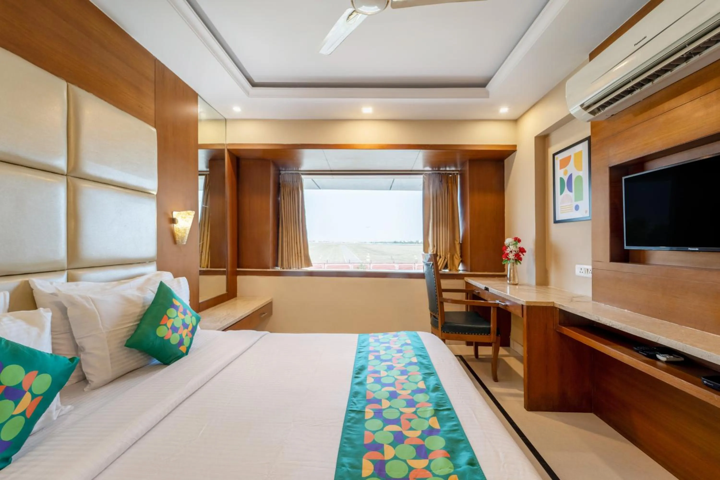 Bedroom, Bed in Treebo Premium Vinnie - Near Airport