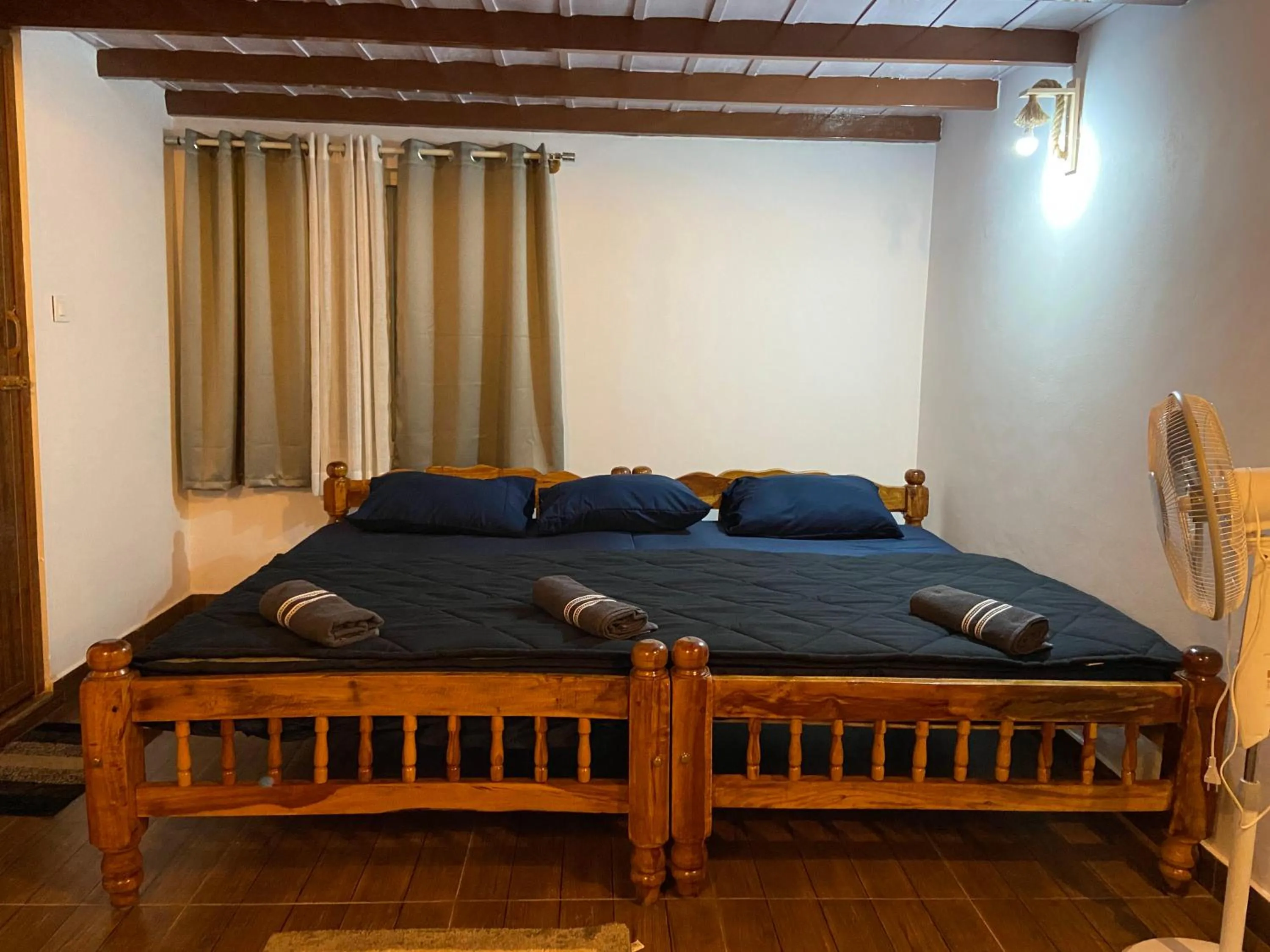 Bed in Coorg klusters estate stay