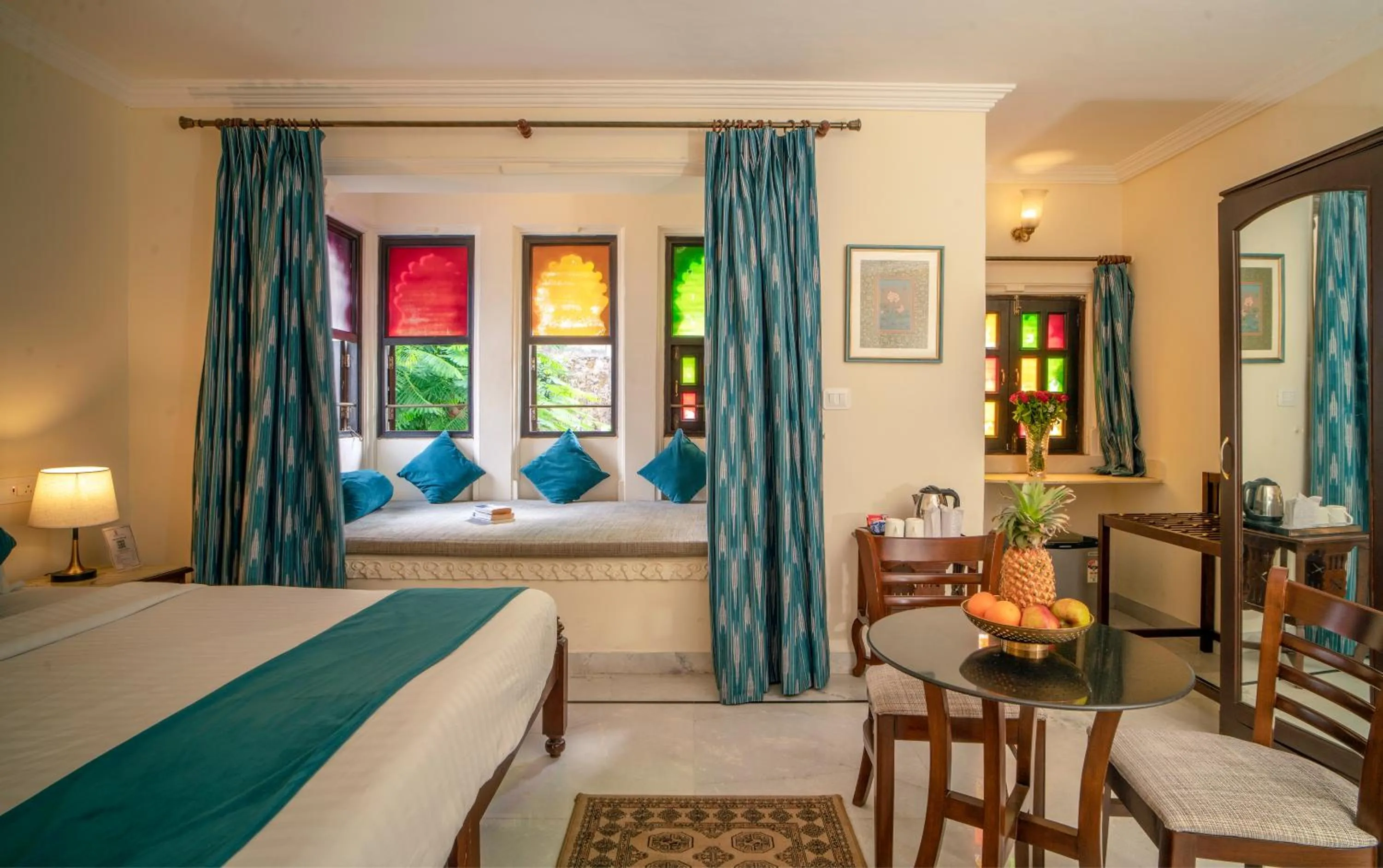 Seating area, Bed in Swaroop Vilas - Lake Facing Boutique Hotel