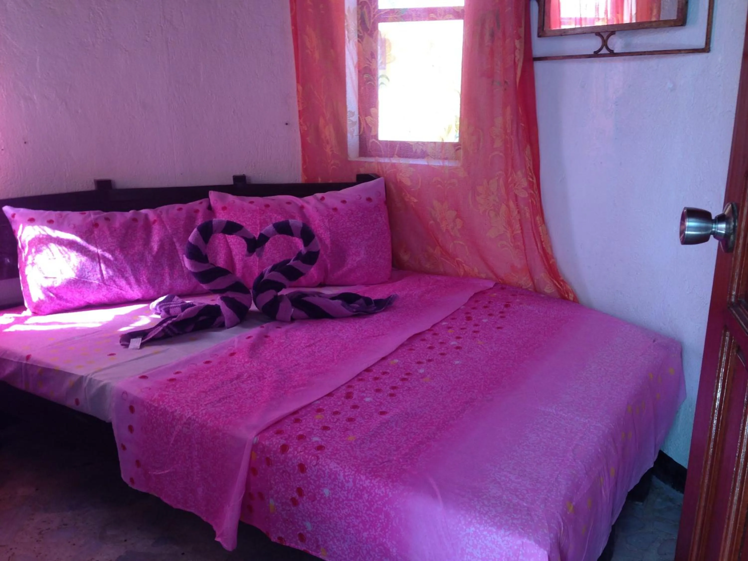 Bed in White & Yellow Castle Hotel and Resort