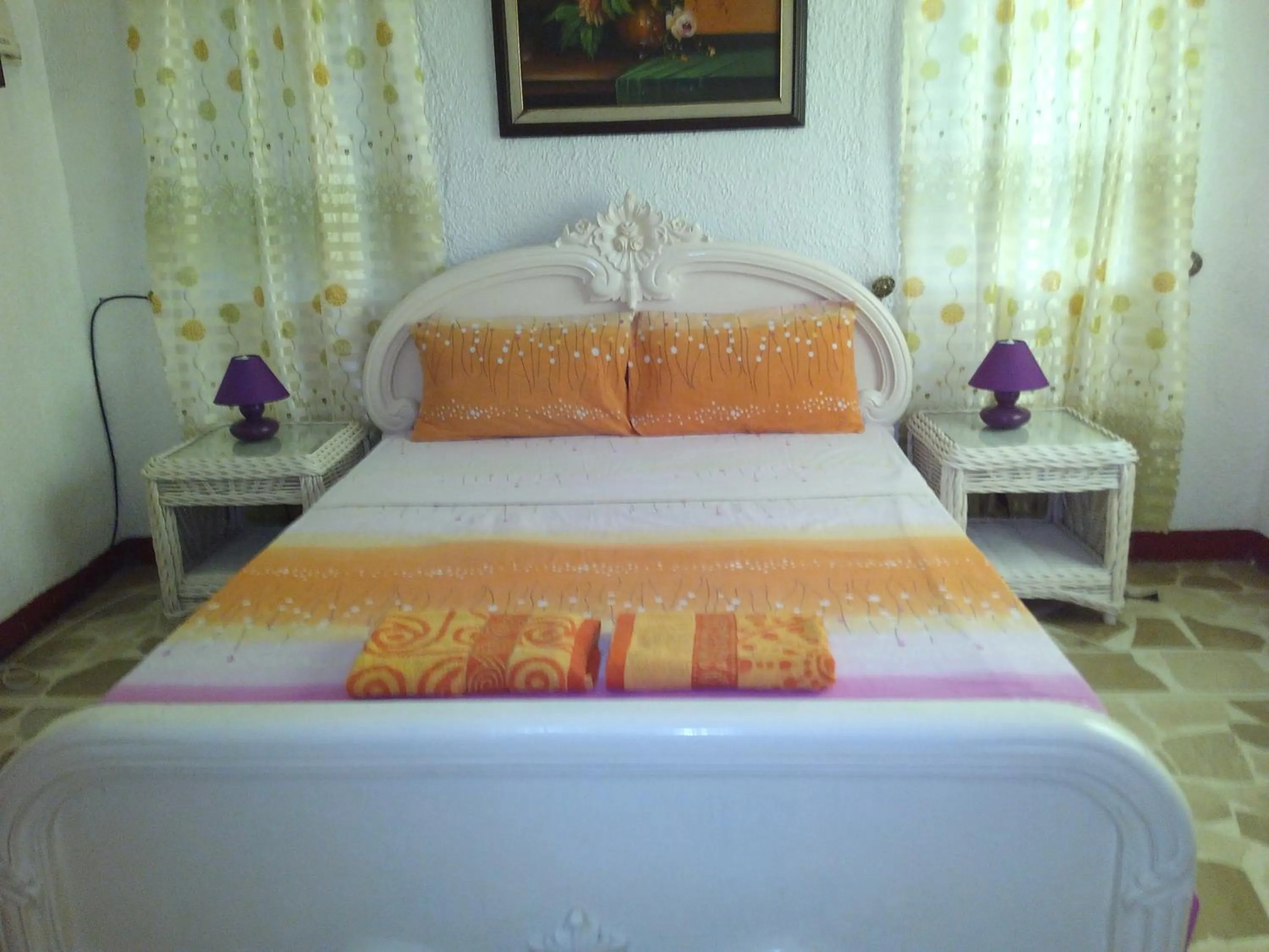 Bed in White & Yellow Castle Hotel and Resort