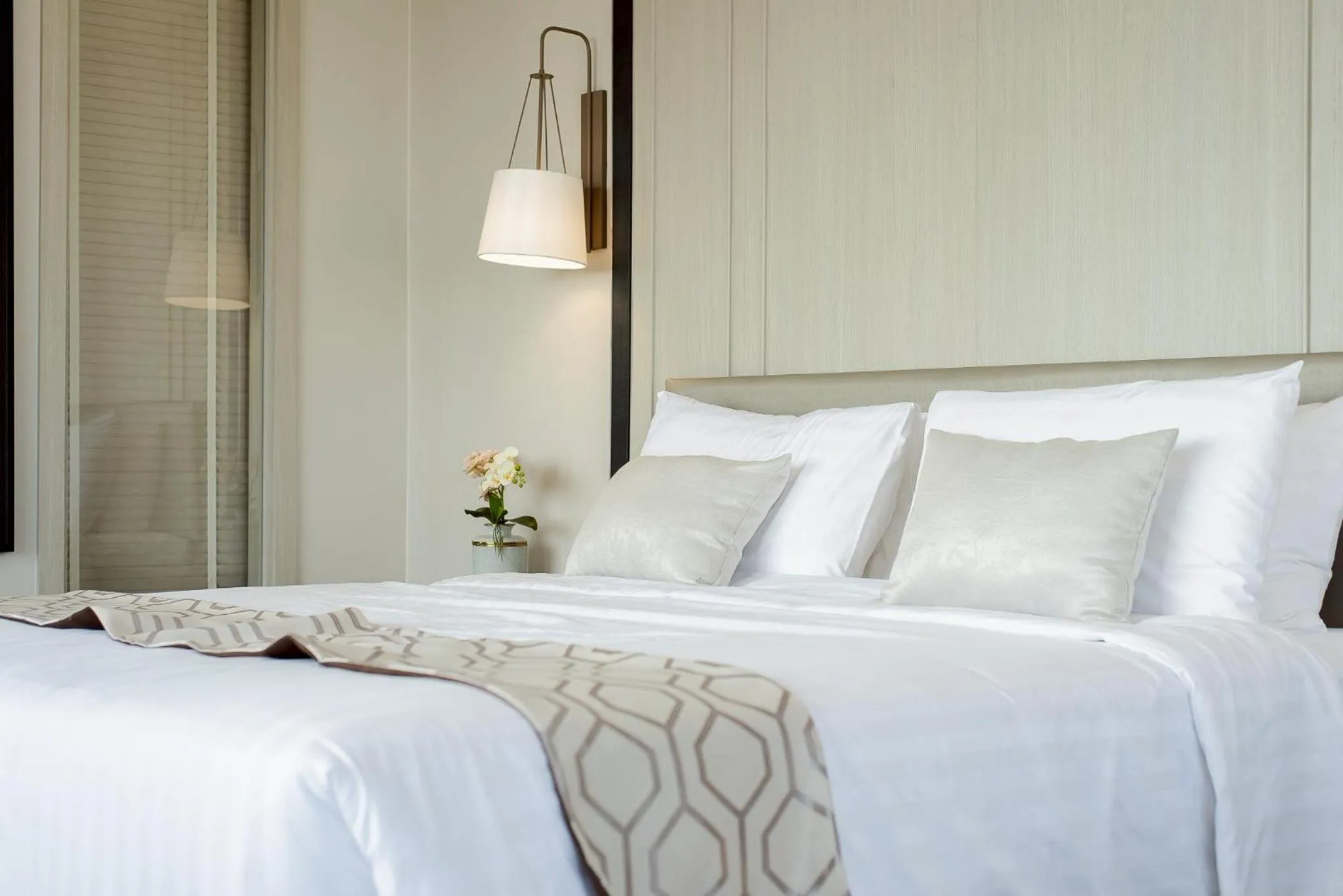 Bed in THE NAVY HOUSE HOTEL