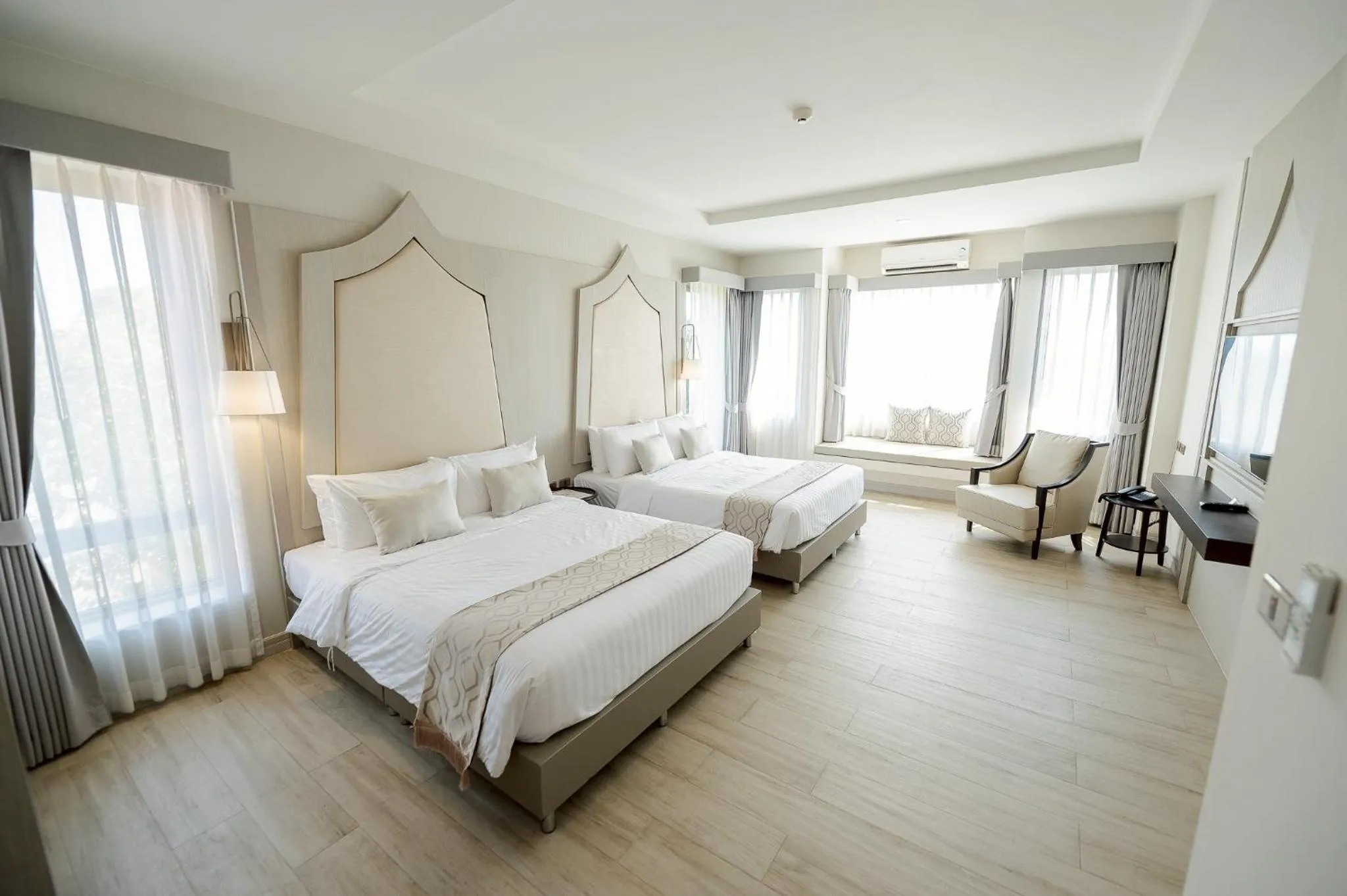 Bed in THE NAVY HOUSE HOTEL