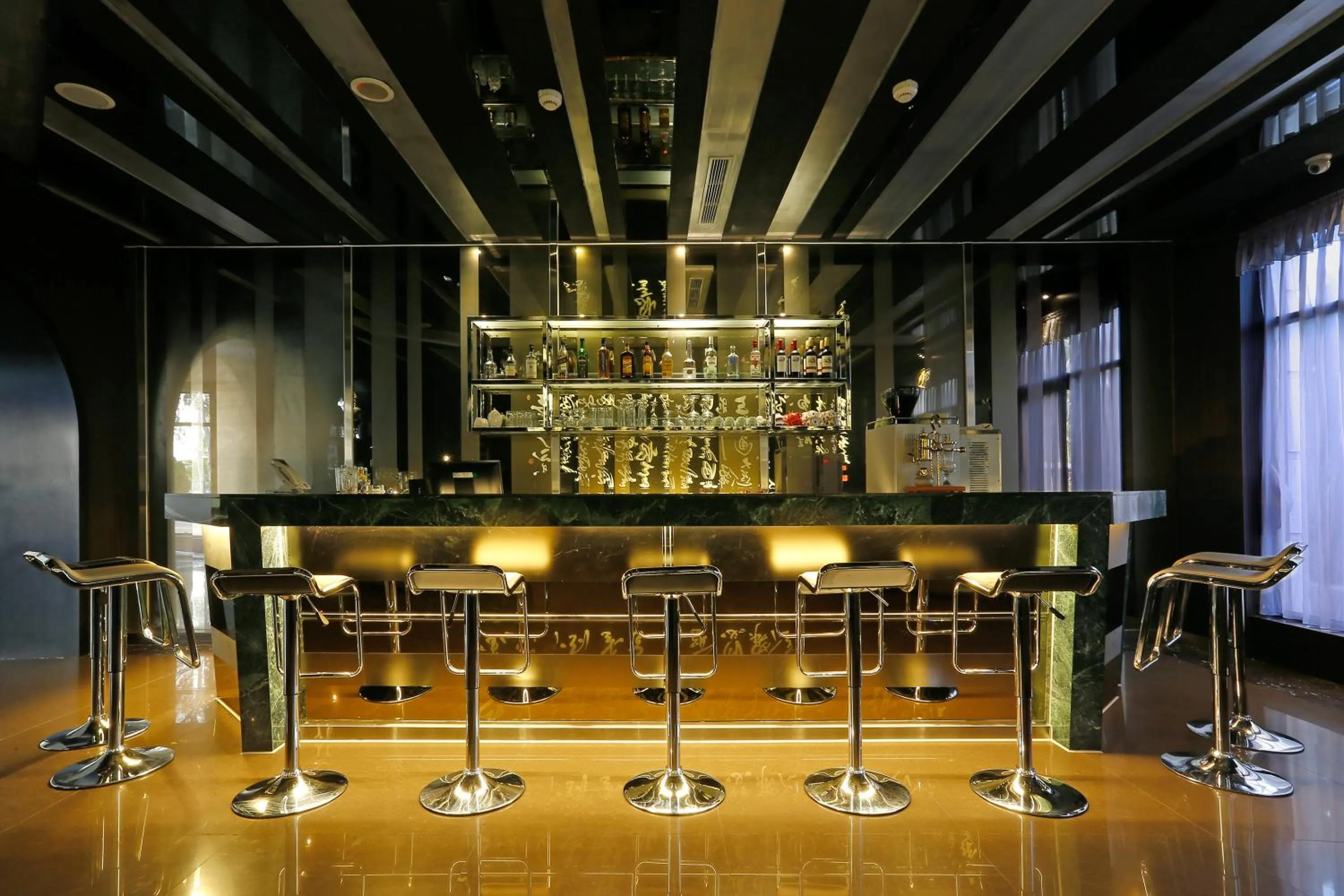 Lounge or bar in Golden Tulip - Aesthetics