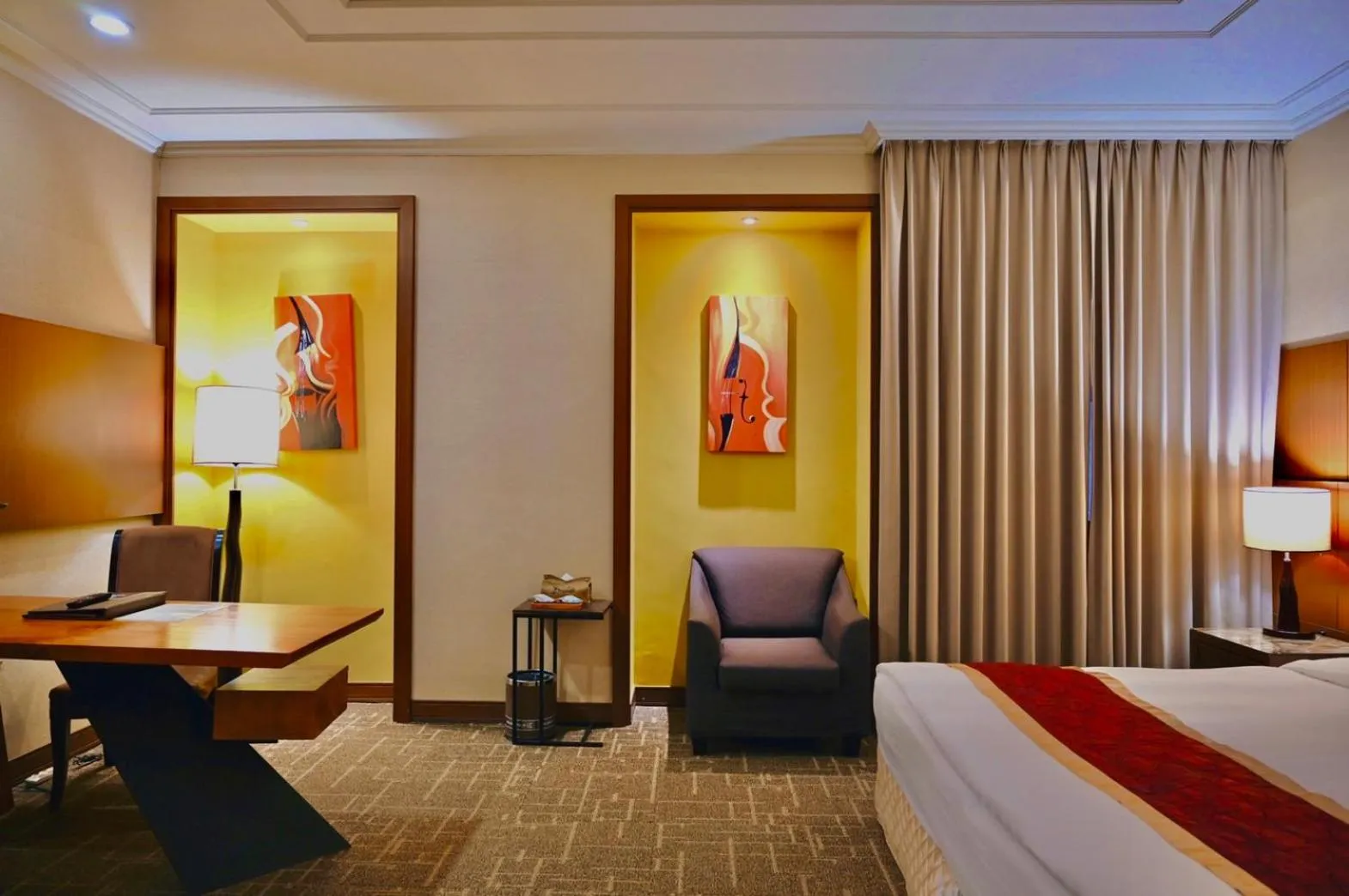 Photo of the whole room, Bed in Golden Tulip - Aesthetics