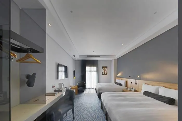 Photo of the whole room, Bed in Golden Tulip - Aesthetics