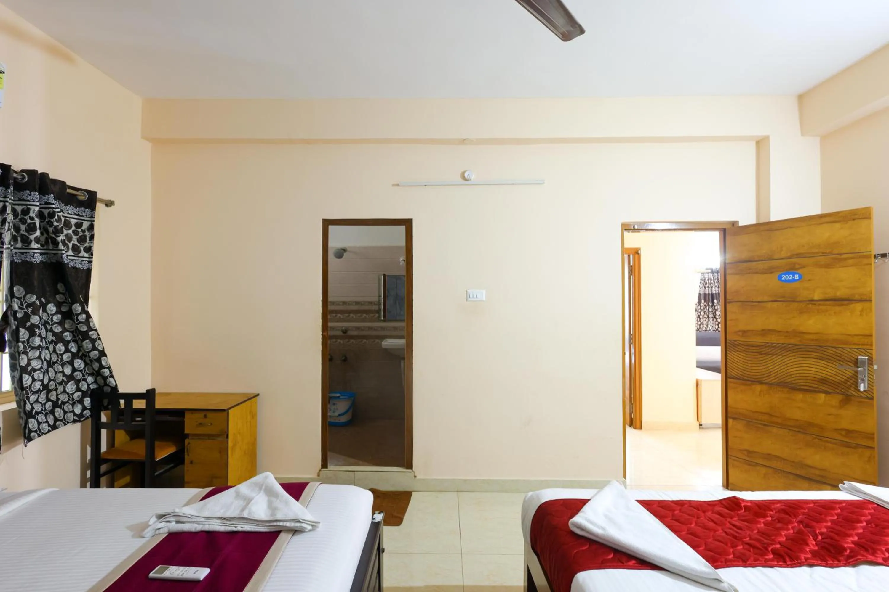 Photo of the whole room, Bed in SBHS Homestay - Garudadri - Tirupati Bus Stand