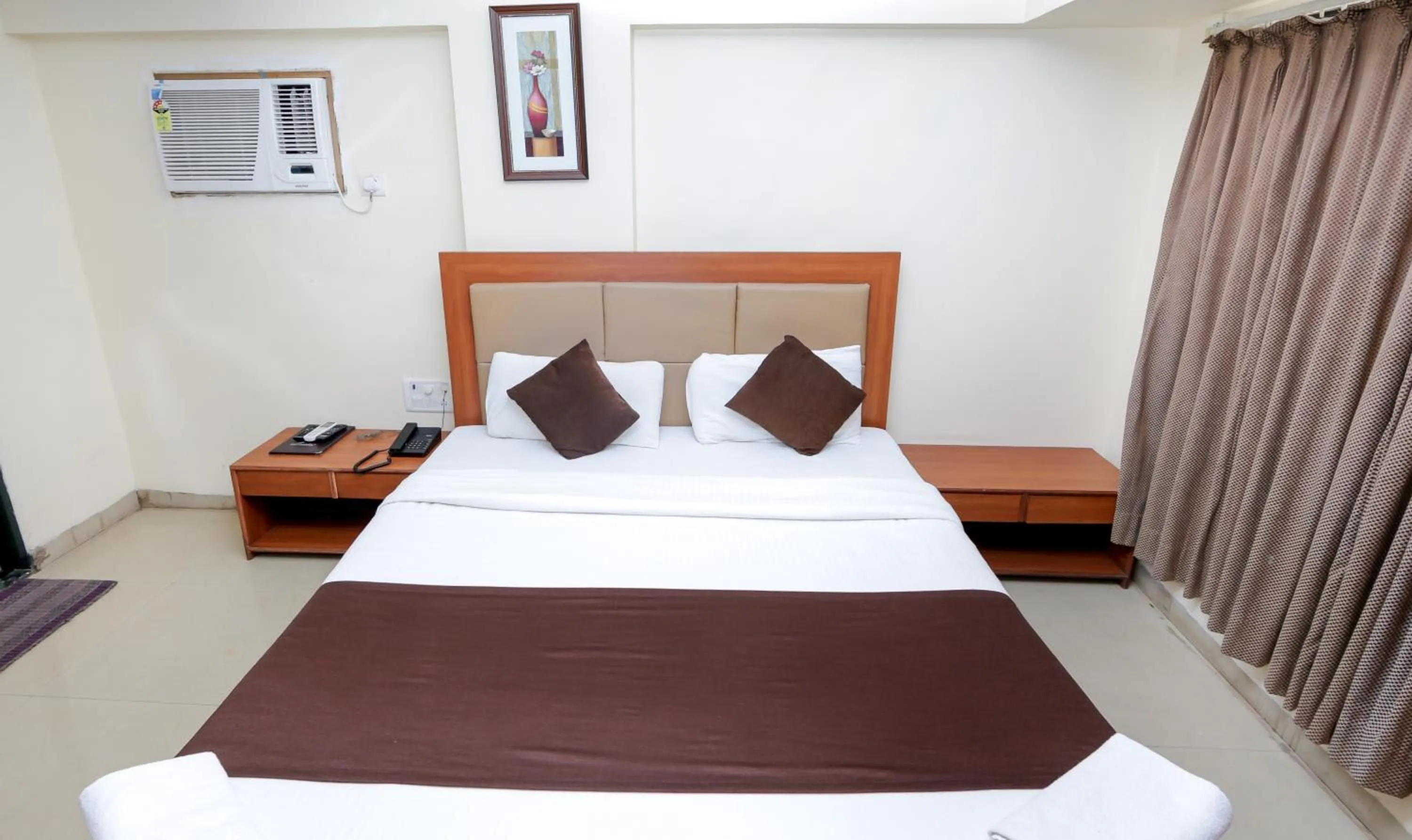 Photo of the whole room, Bed in Hotel Lucky Goregaon