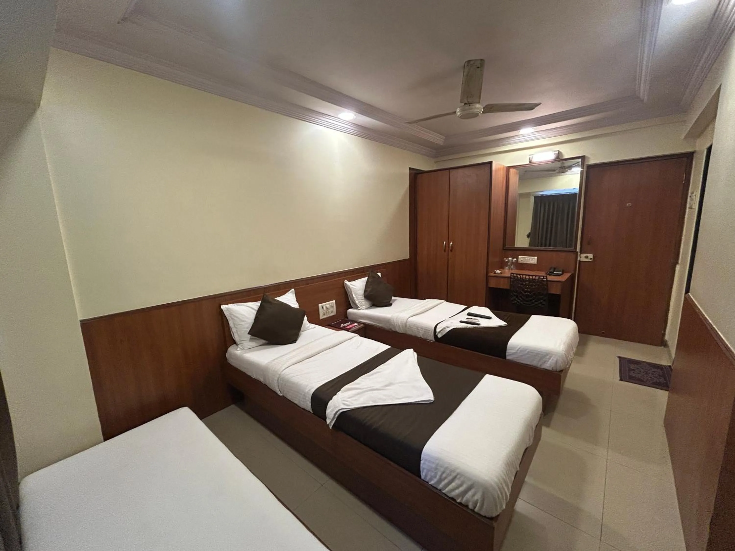 Photo of the whole room, Bed in Hotel Lucky Goregaon