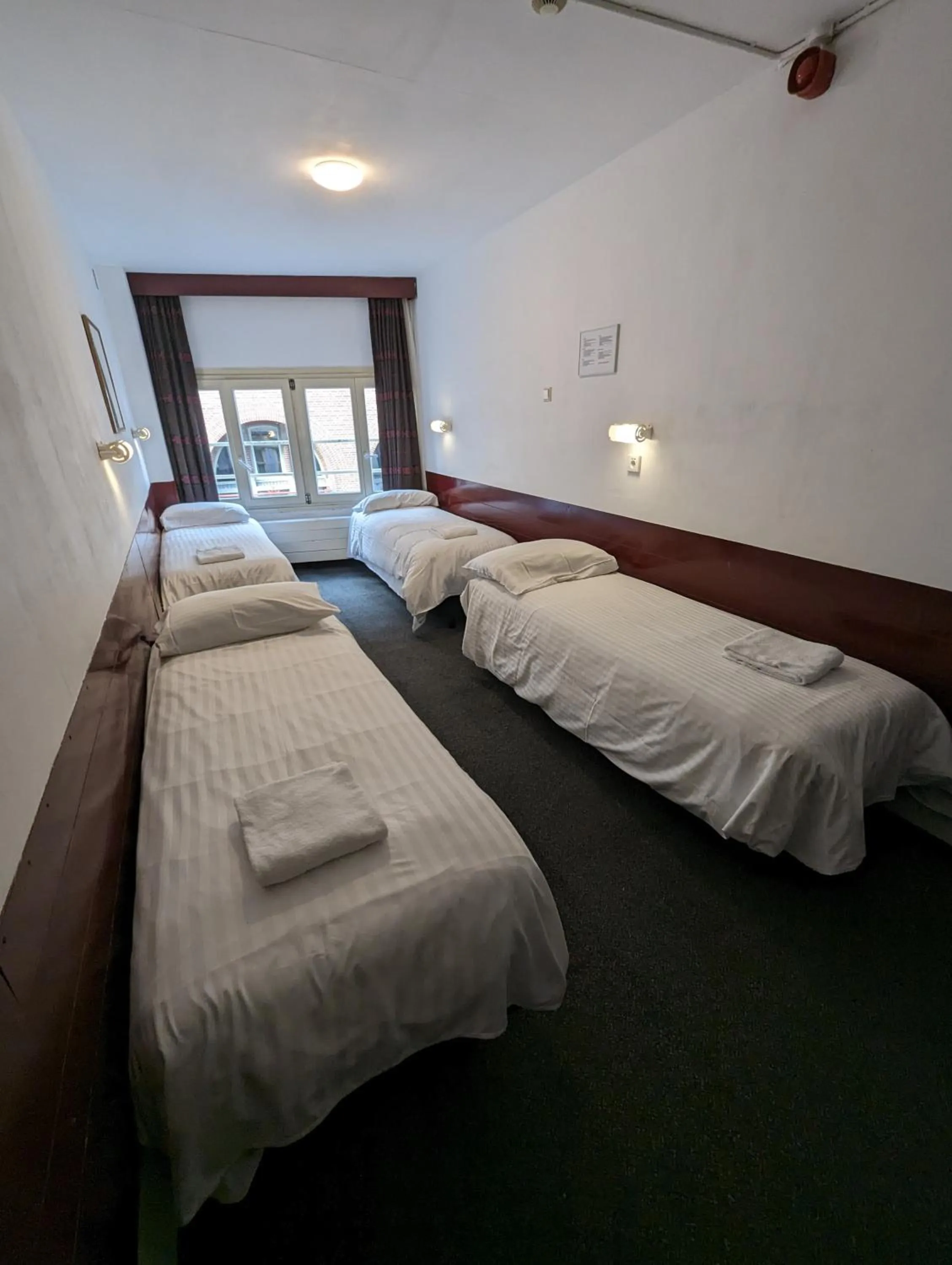 Bed in Budget Hotel Ben