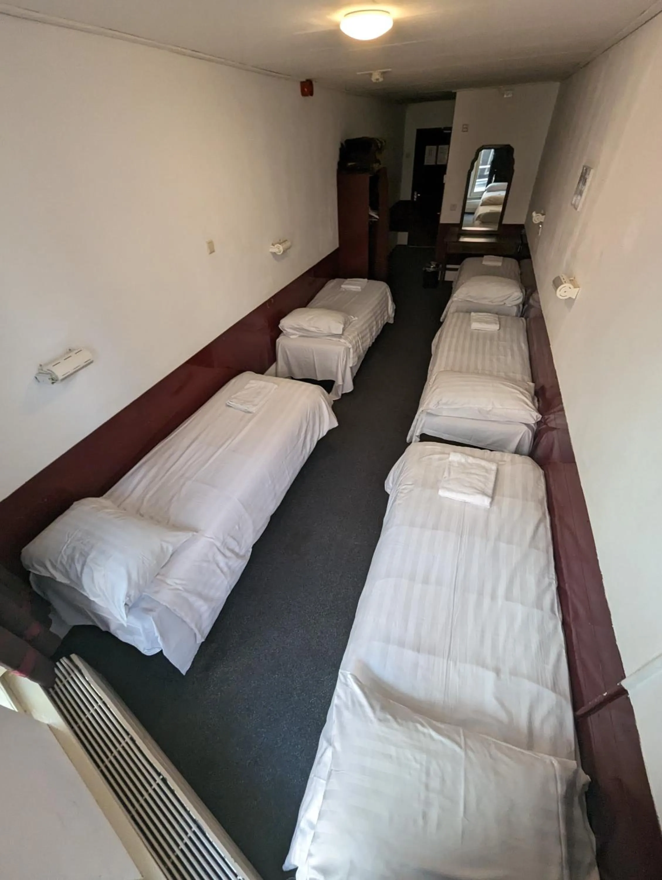 Bed in Budget Hotel Ben