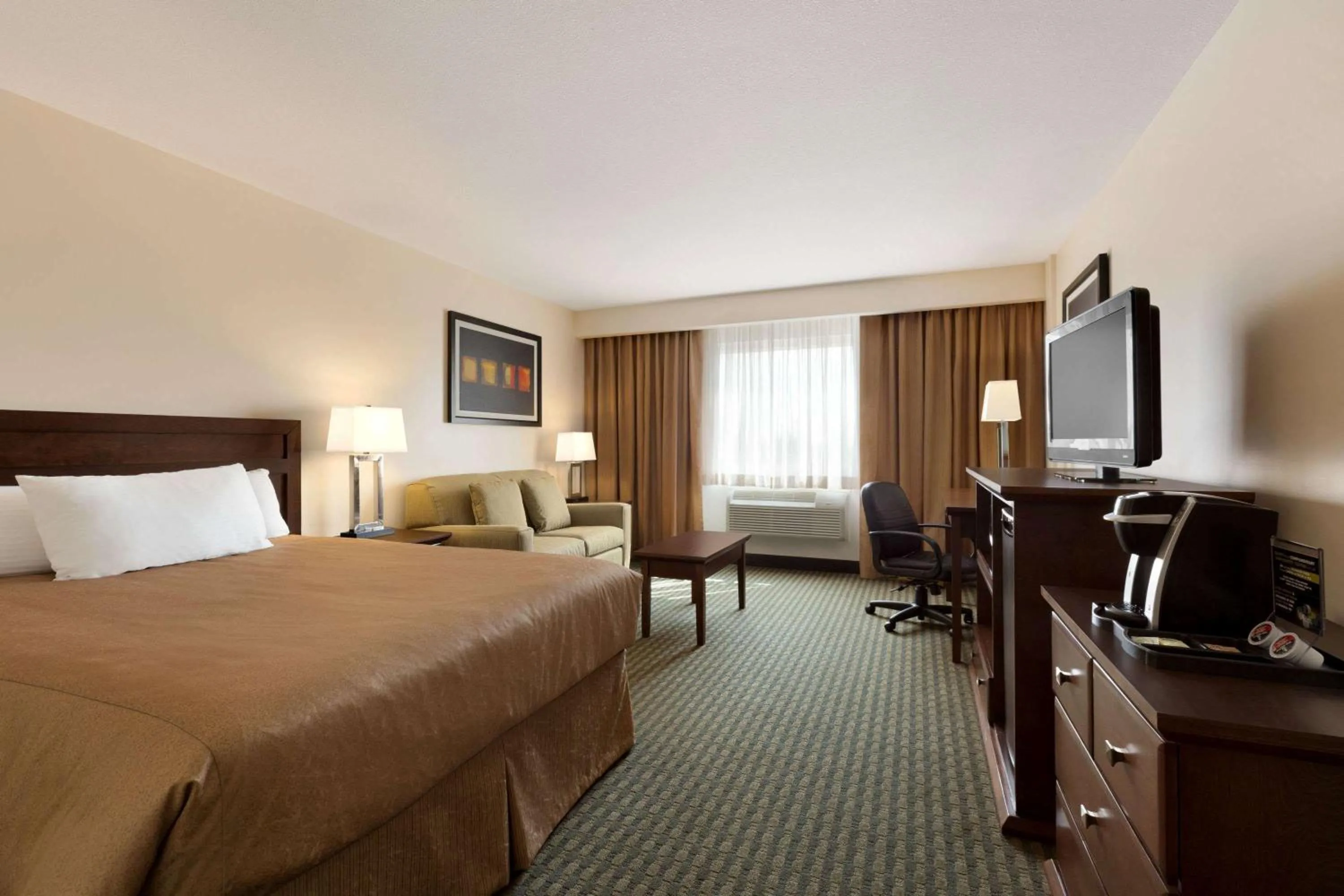 Photo of the whole room, Bed in Travelodge Hotel by Wyndham Weyburn