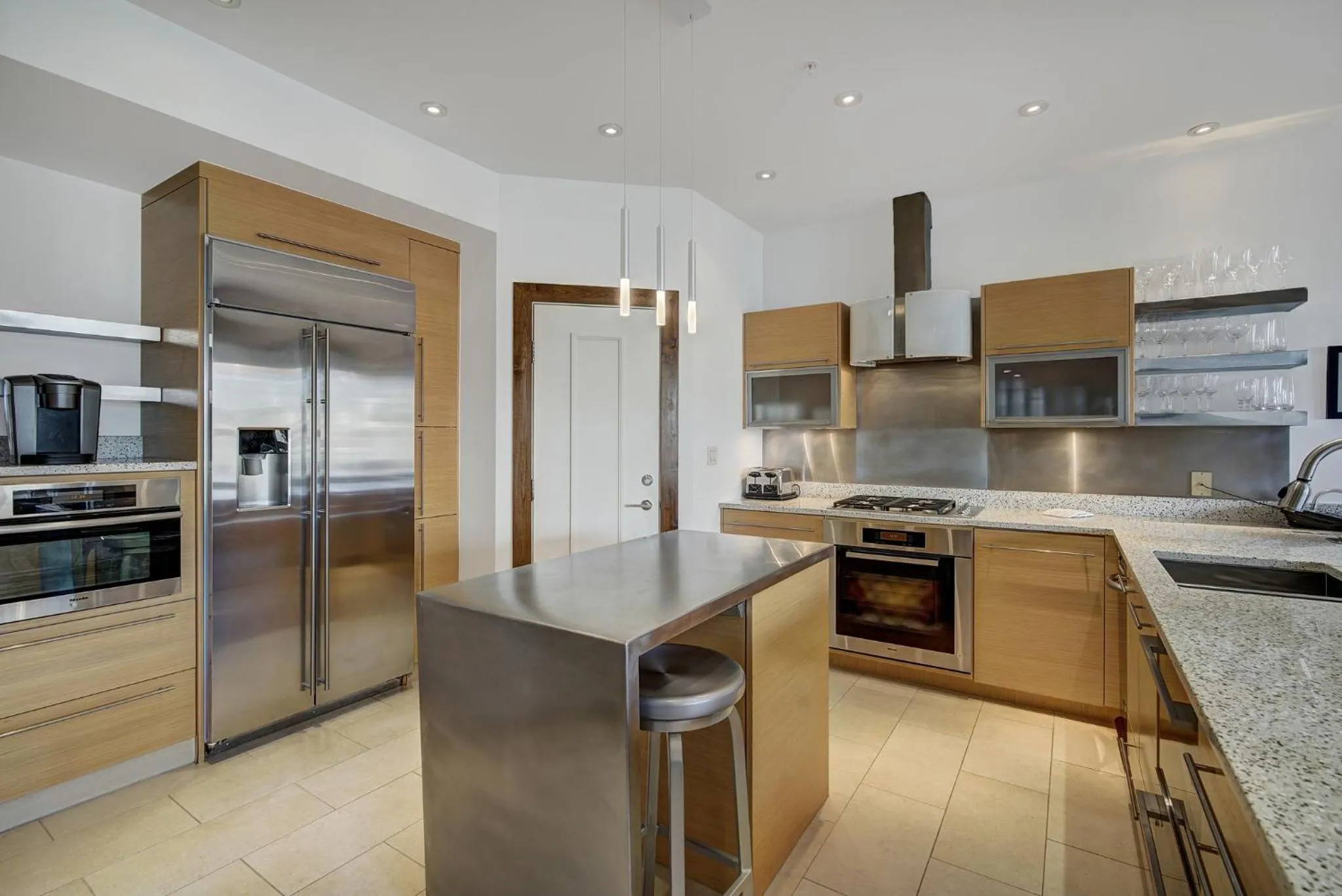 Communal kitchen in The Osprey at Beaver Creek, a RockResort