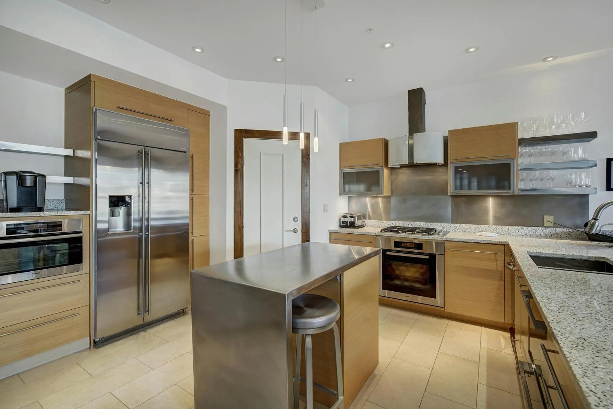 Communal kitchen in The Osprey at Beaver Creek, a RockResort